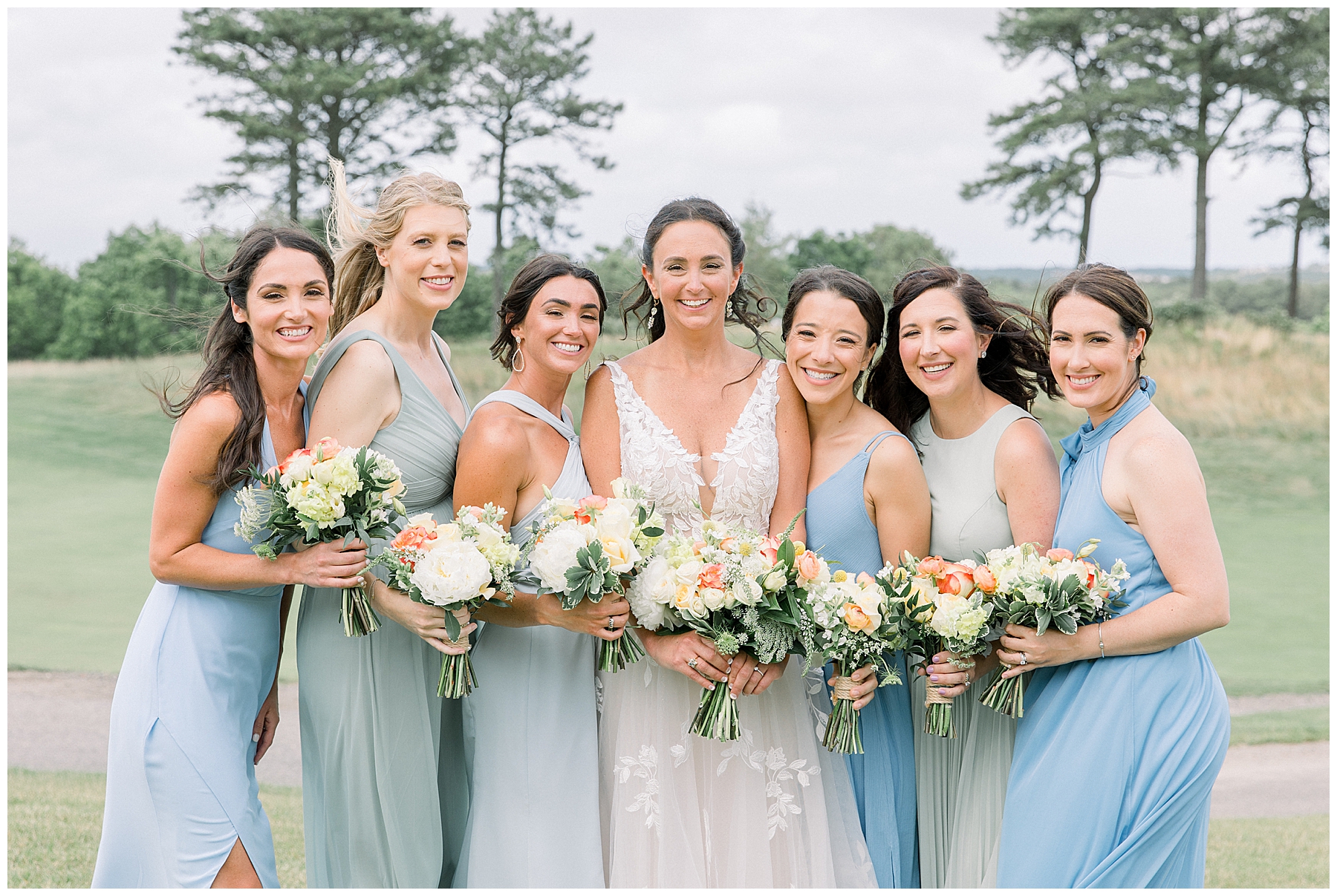 Bride and Bridesmaids with flower bouquets by Olive James Bouquets