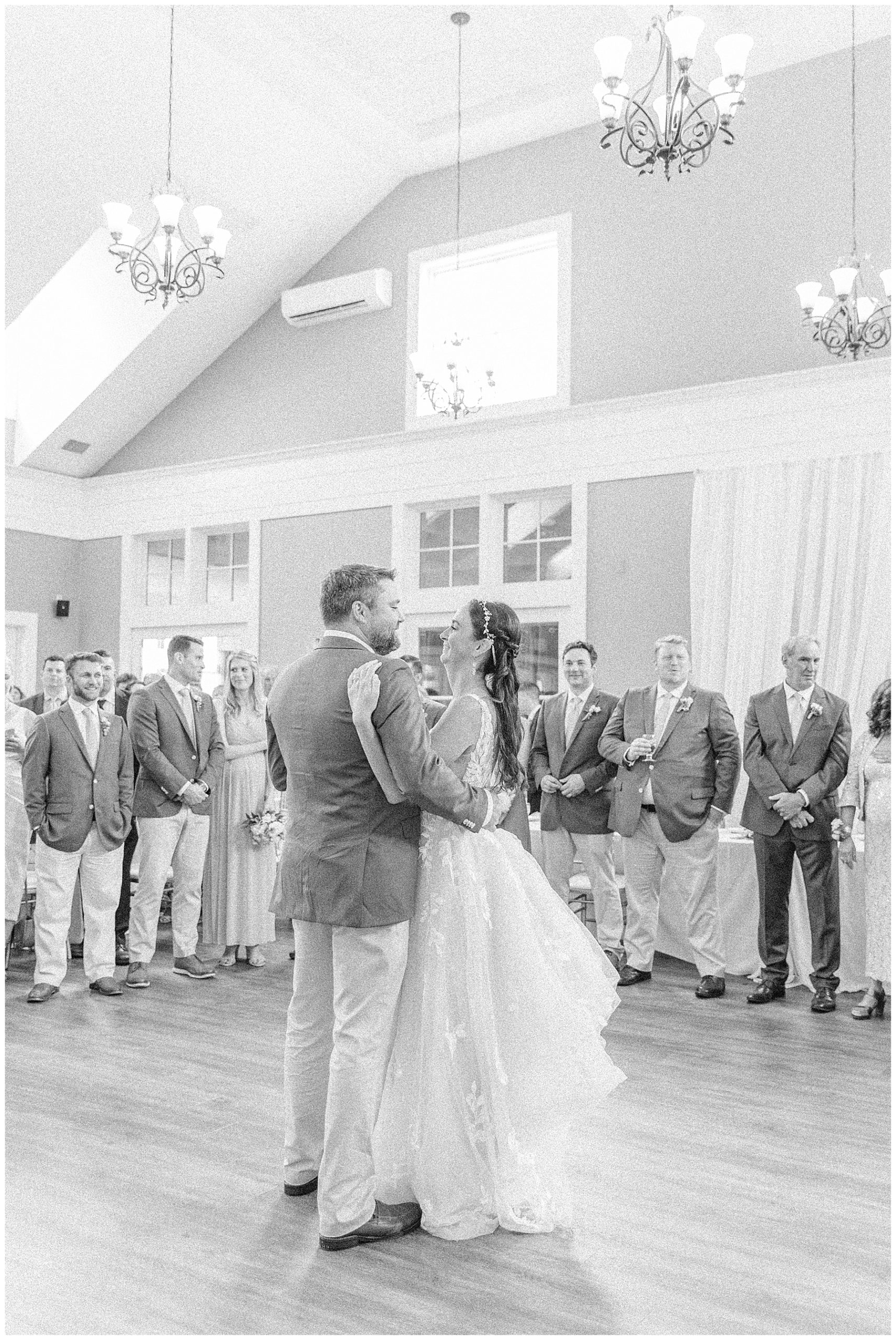 Newlyweds share their first dance as husband + Wife