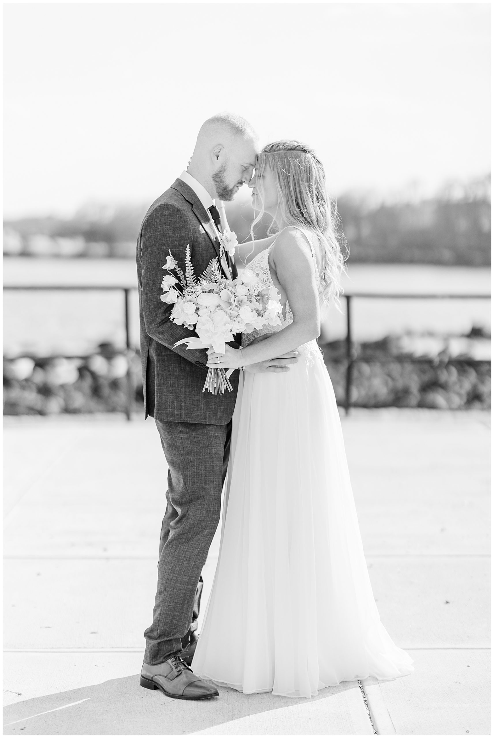 Bride + Groom share intimate moment Beauport Hotel Gloucester Wedding ceremony photographed by Stephanie Berenson