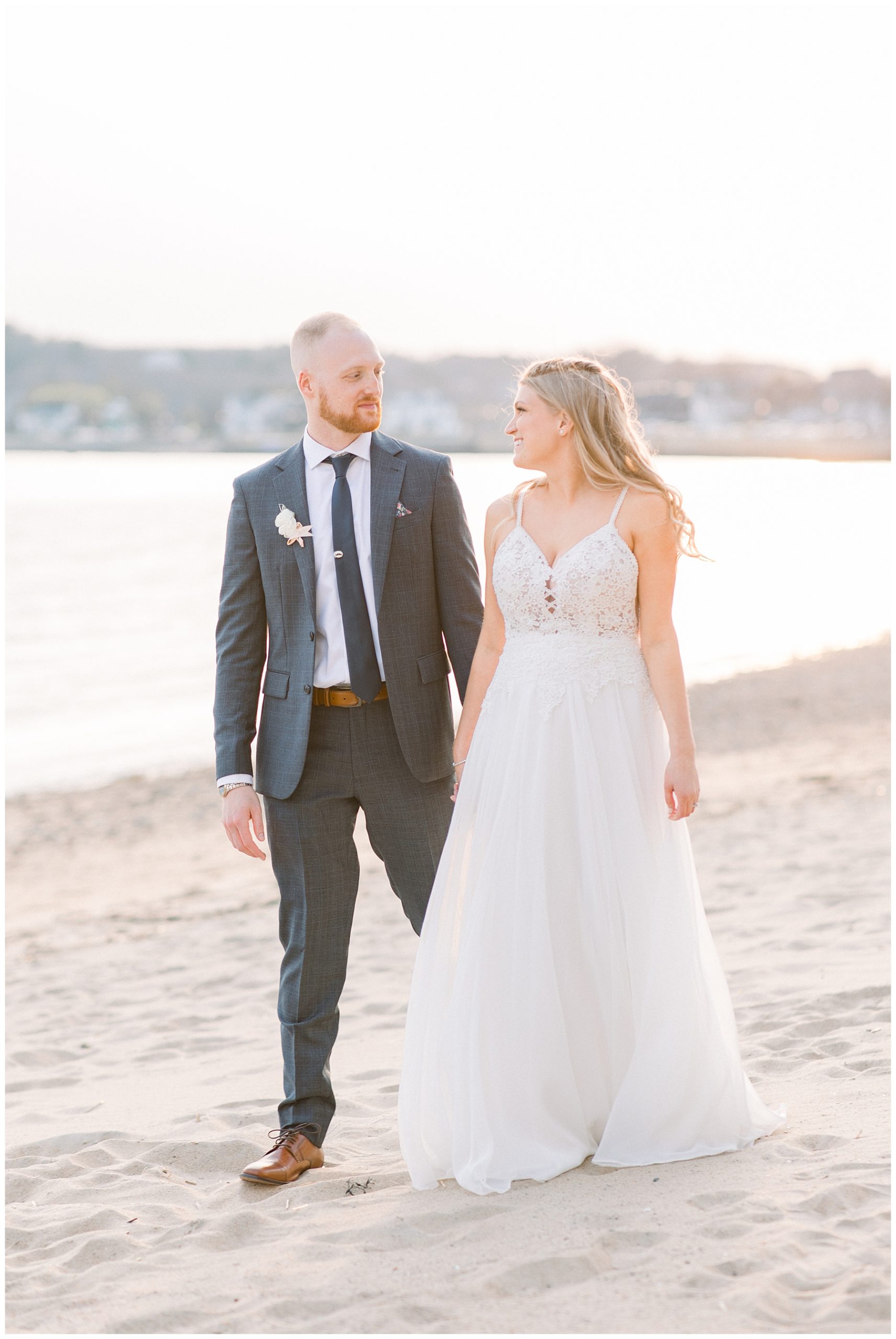 Bride and groom on the beach at Beauport Hotel wedding in Gloucester MA