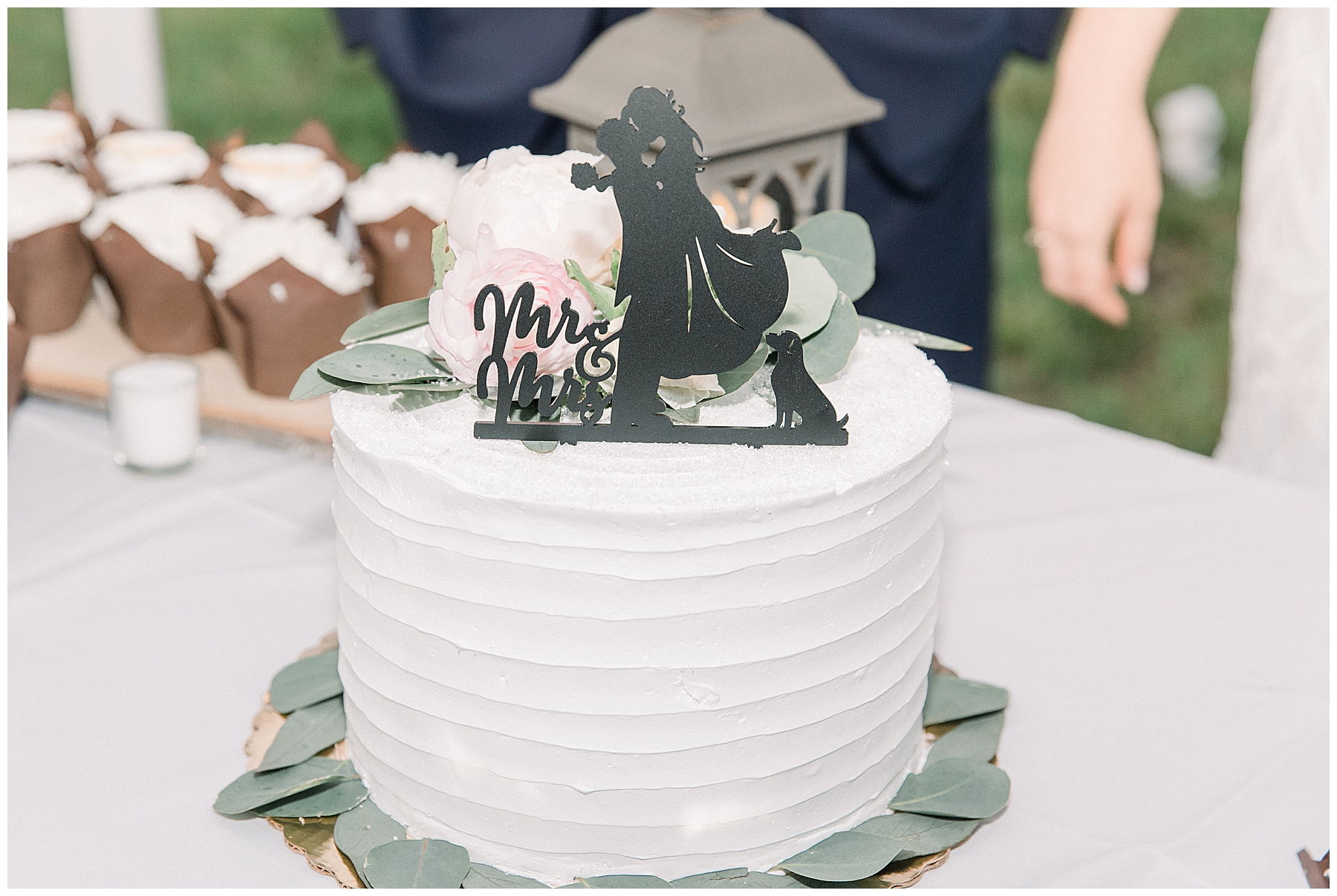 wedding cake with black topper