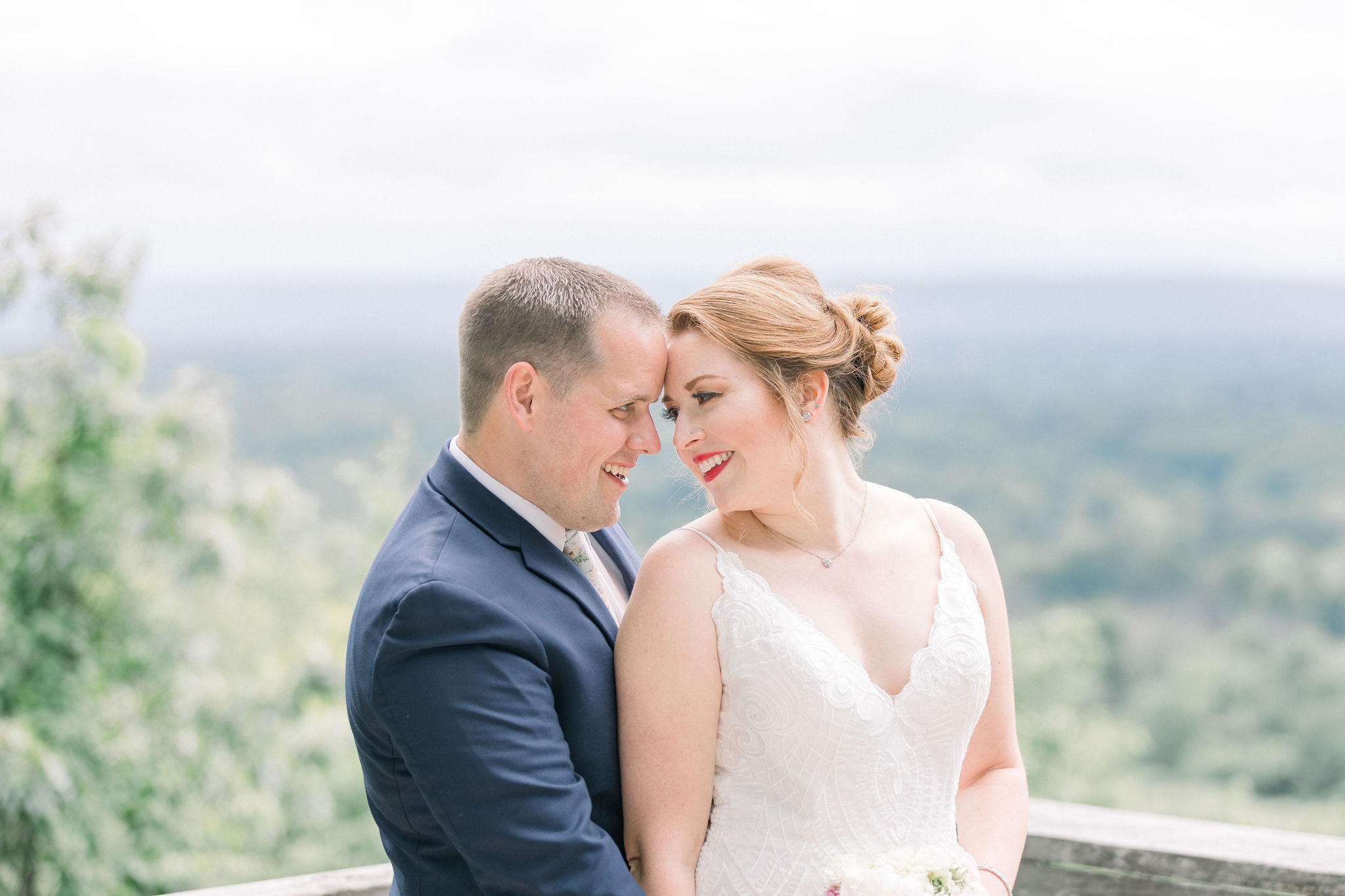 husband + Wife share intimate moment together during Rogers Orchard Wedding captured by Stephanie Berenson Photography
