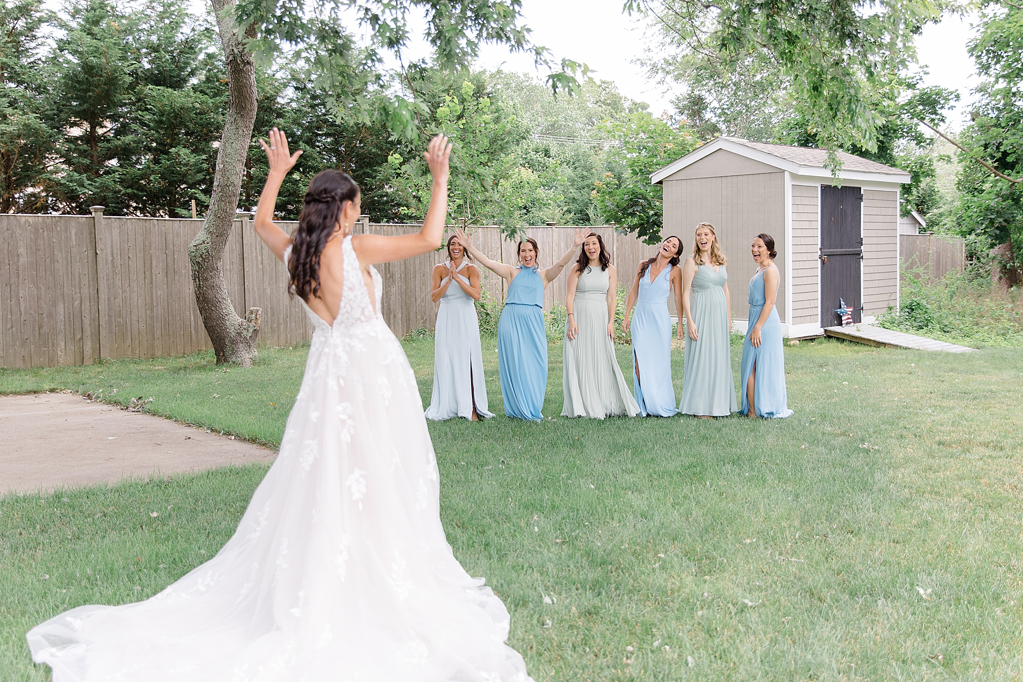 bridesmaids react to first look with bride during Waverly Oaks Golf Club wedding