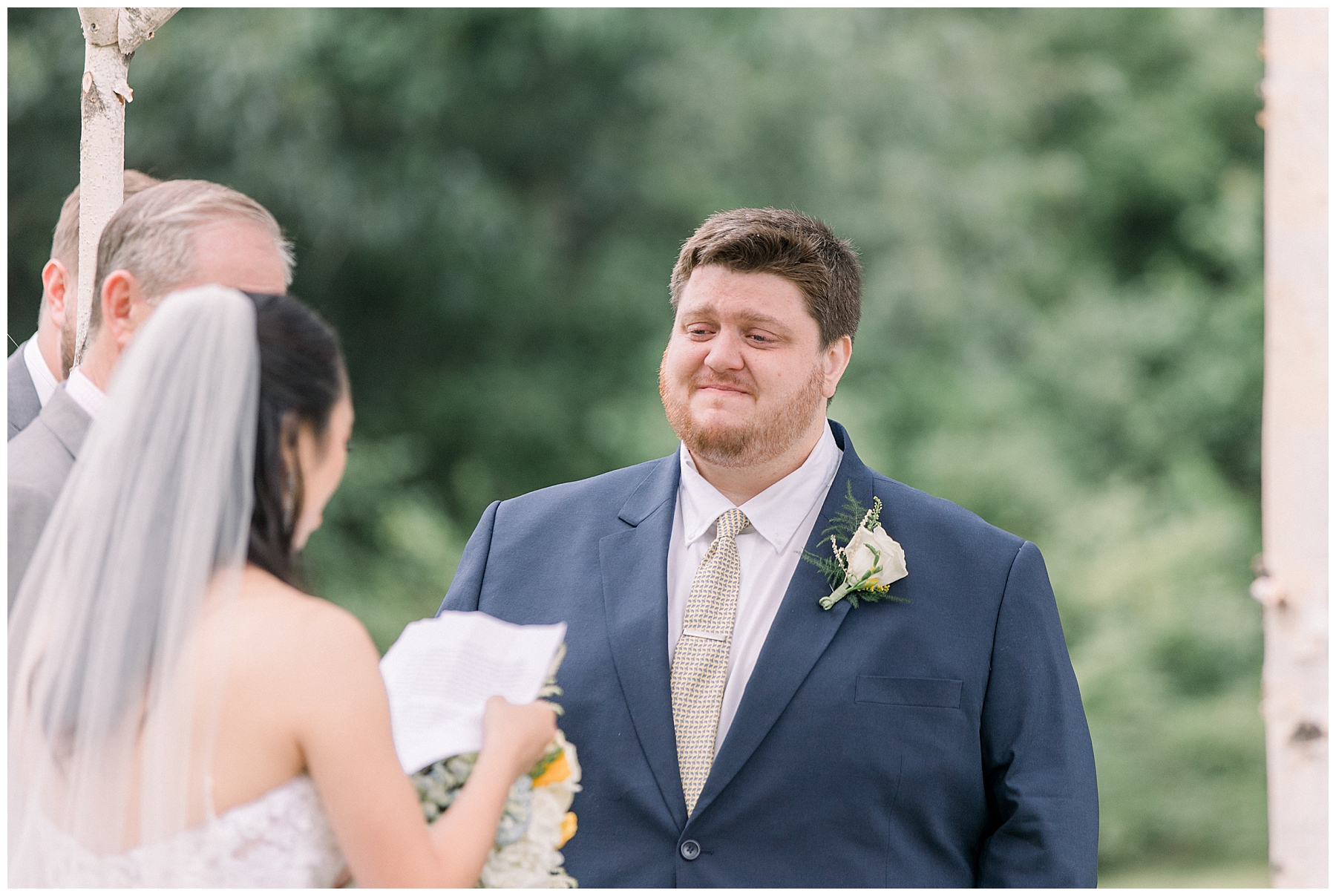 groom gets emotional listening to wife's vows