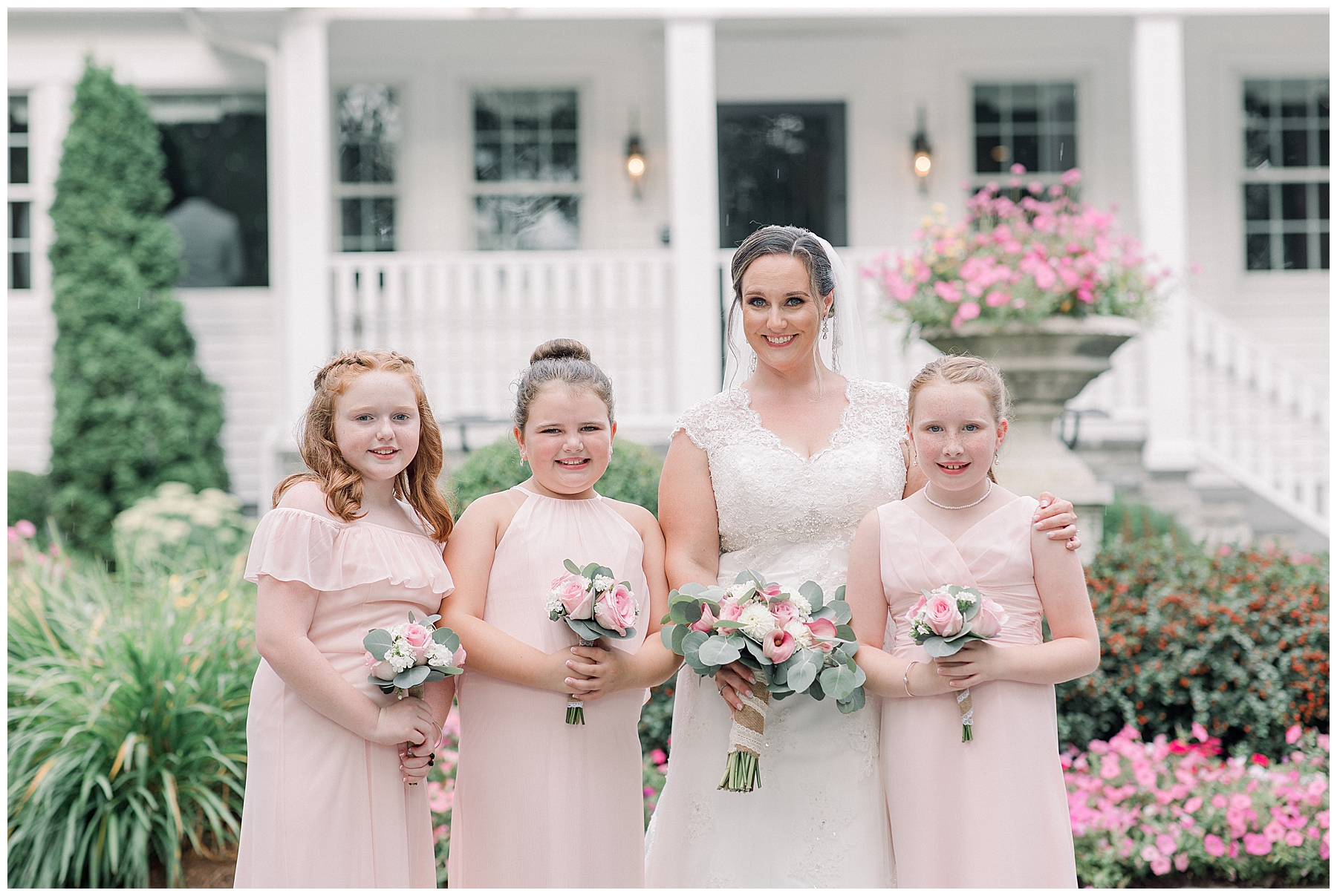 bride with her flower girls