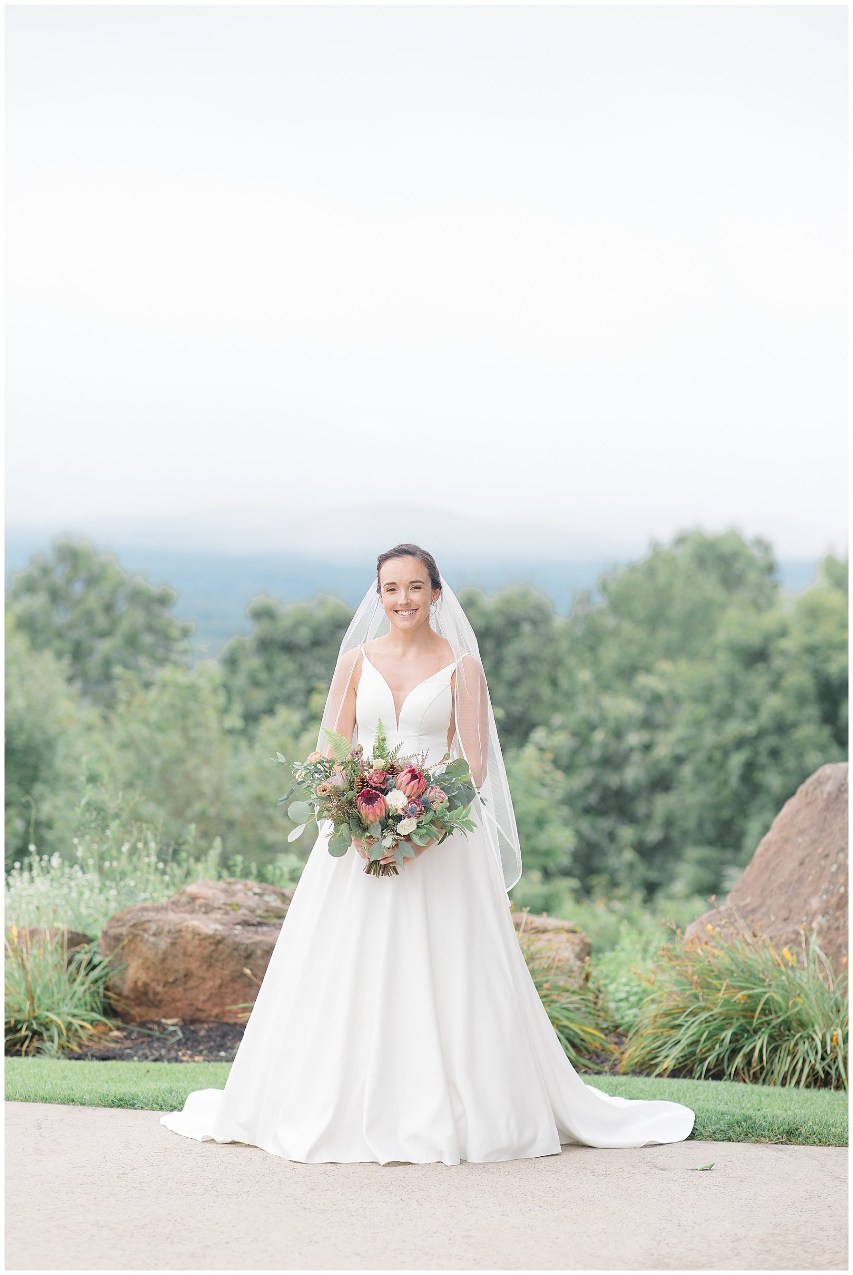 Bride portrait with MA Mountainside in background