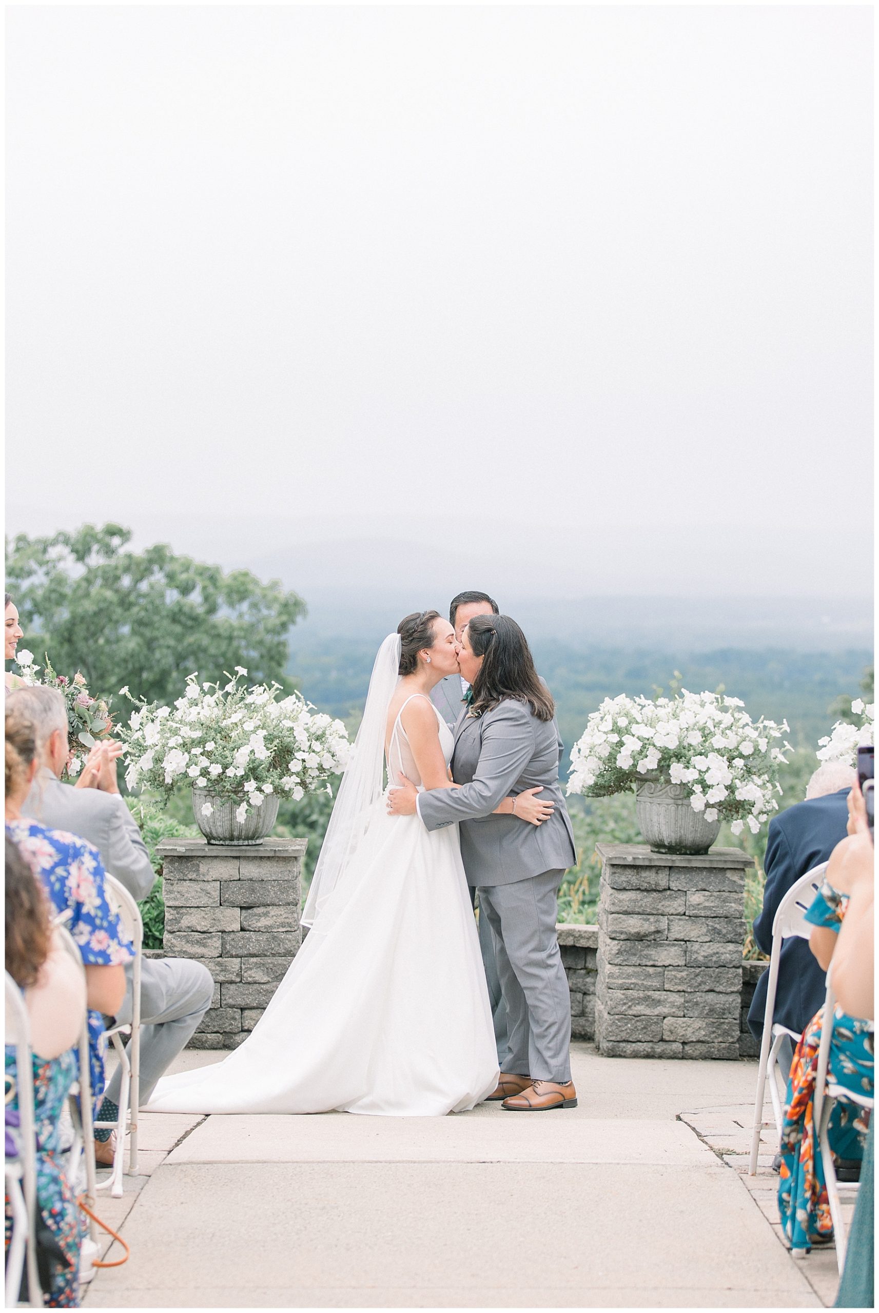 newlyweds kiss at wedding ceremony