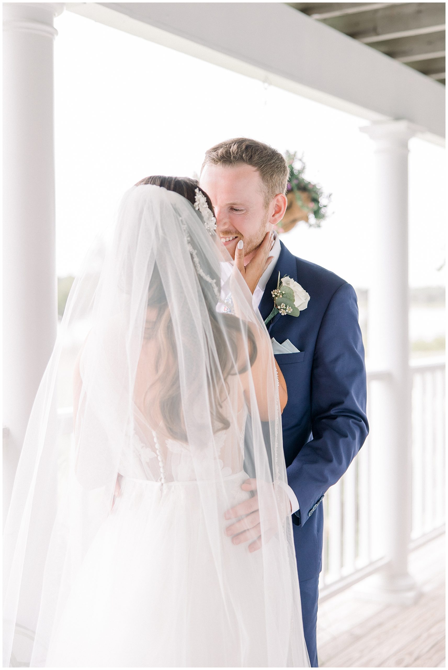 groom sees bride during first look