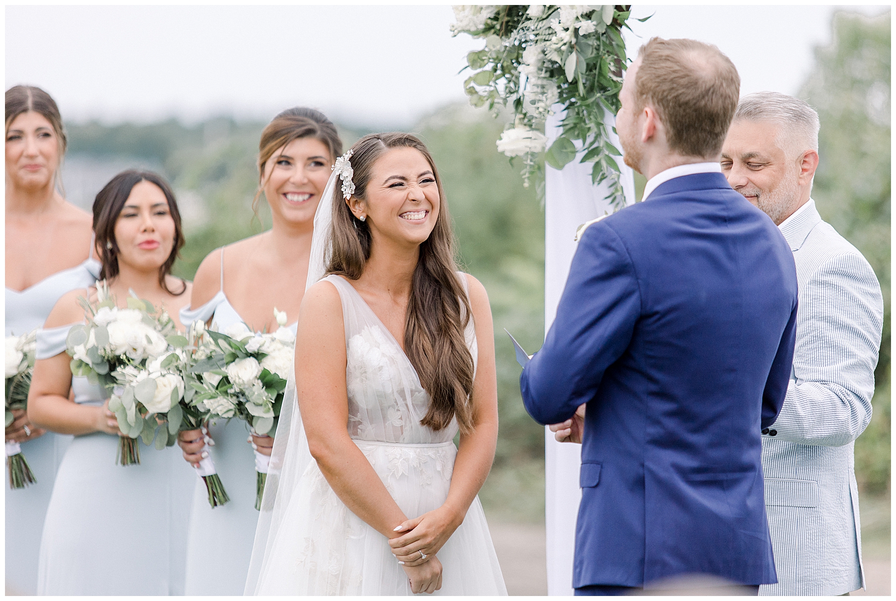 bride laughs and smiles at her future husband
