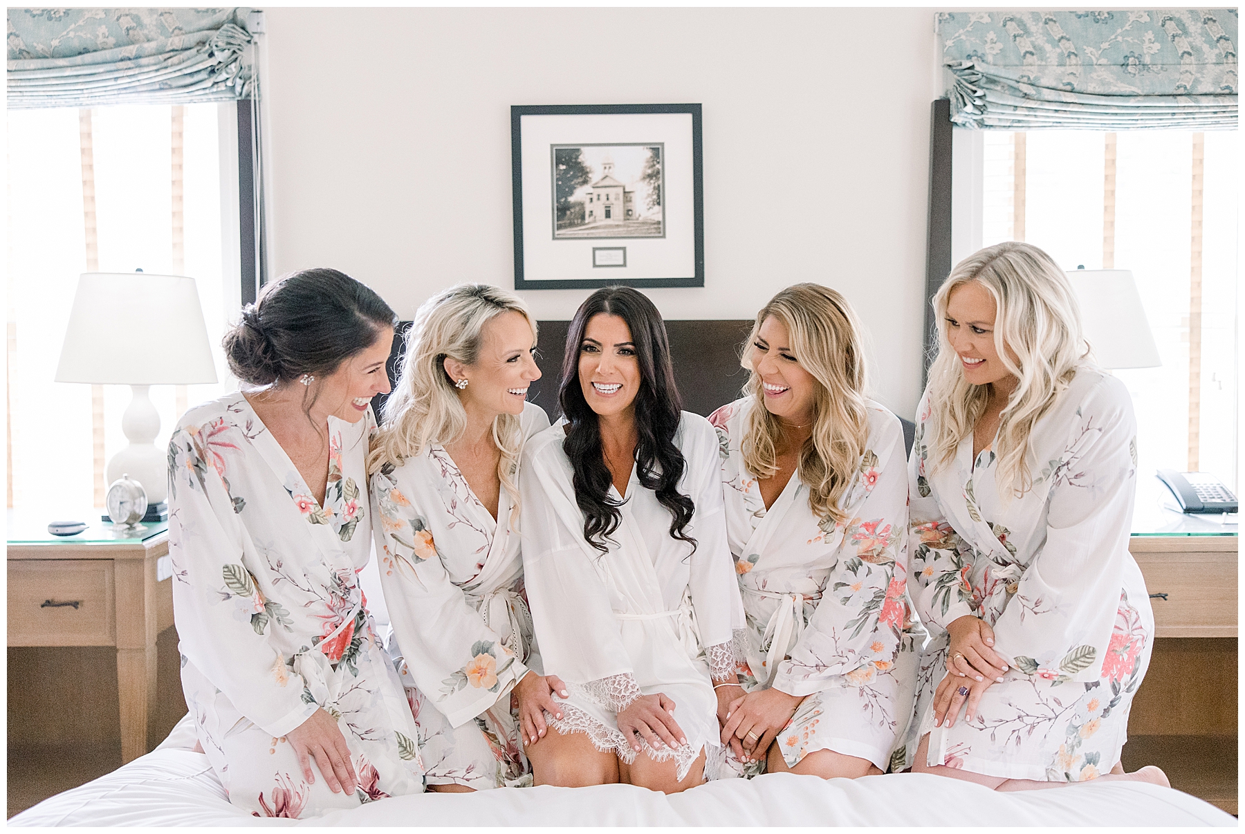 bride and her bridesmaids in matching robes