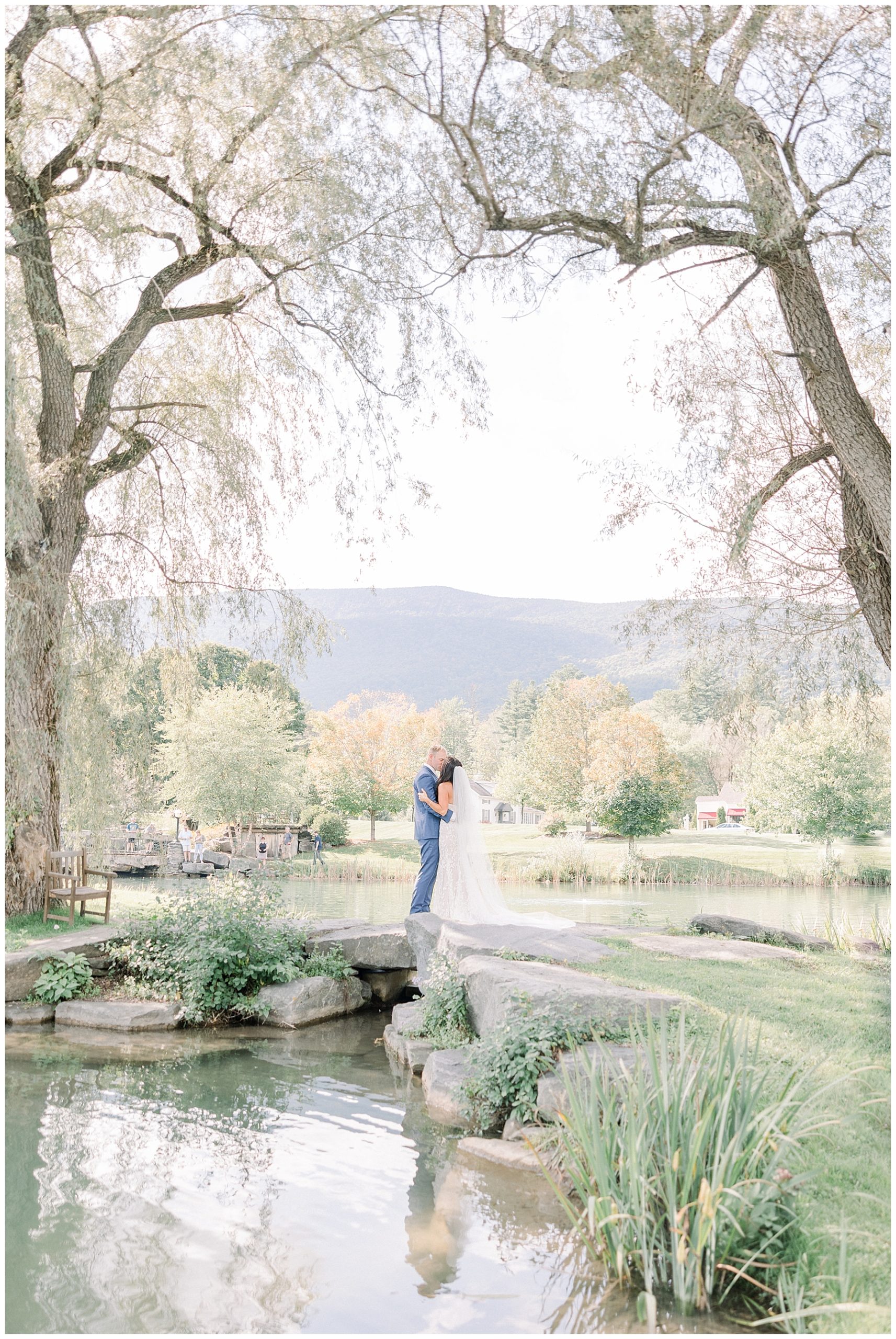 bride and groom portraits with gorgeous mountain views in Vermont