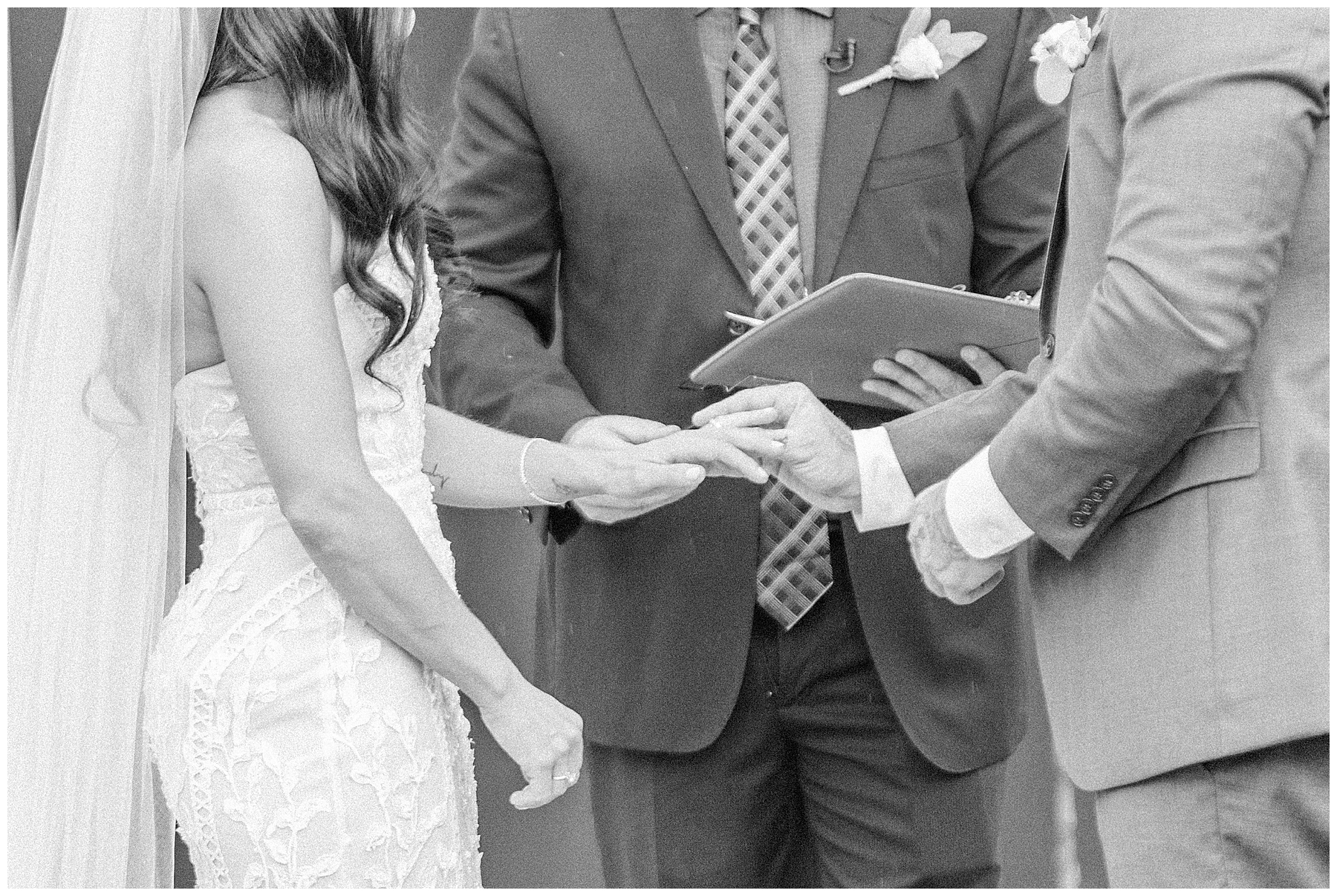 couple exchange wedding rings during ceremony