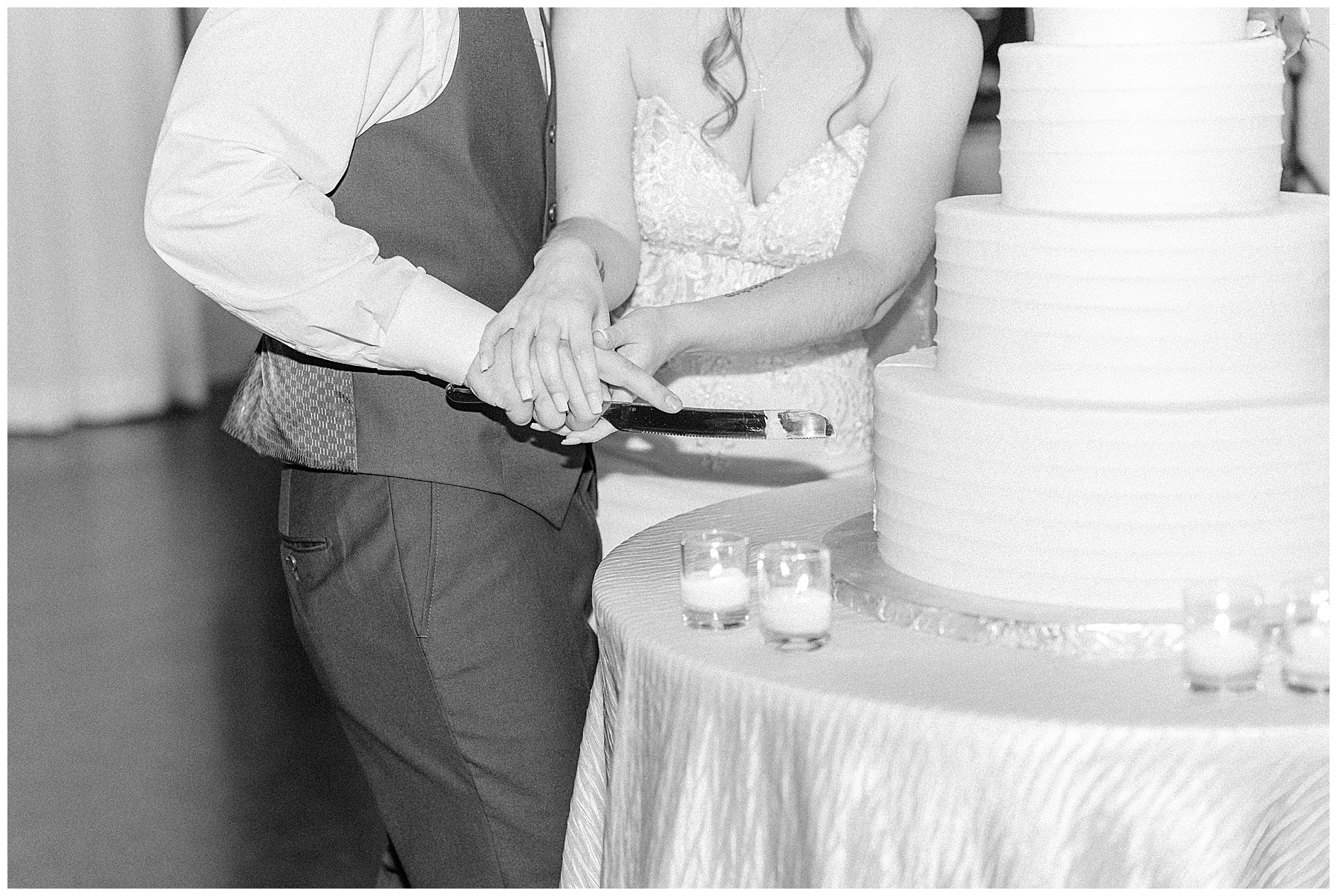 bride and groom cutting cake at Lakeview Pavilion MA wedding reception