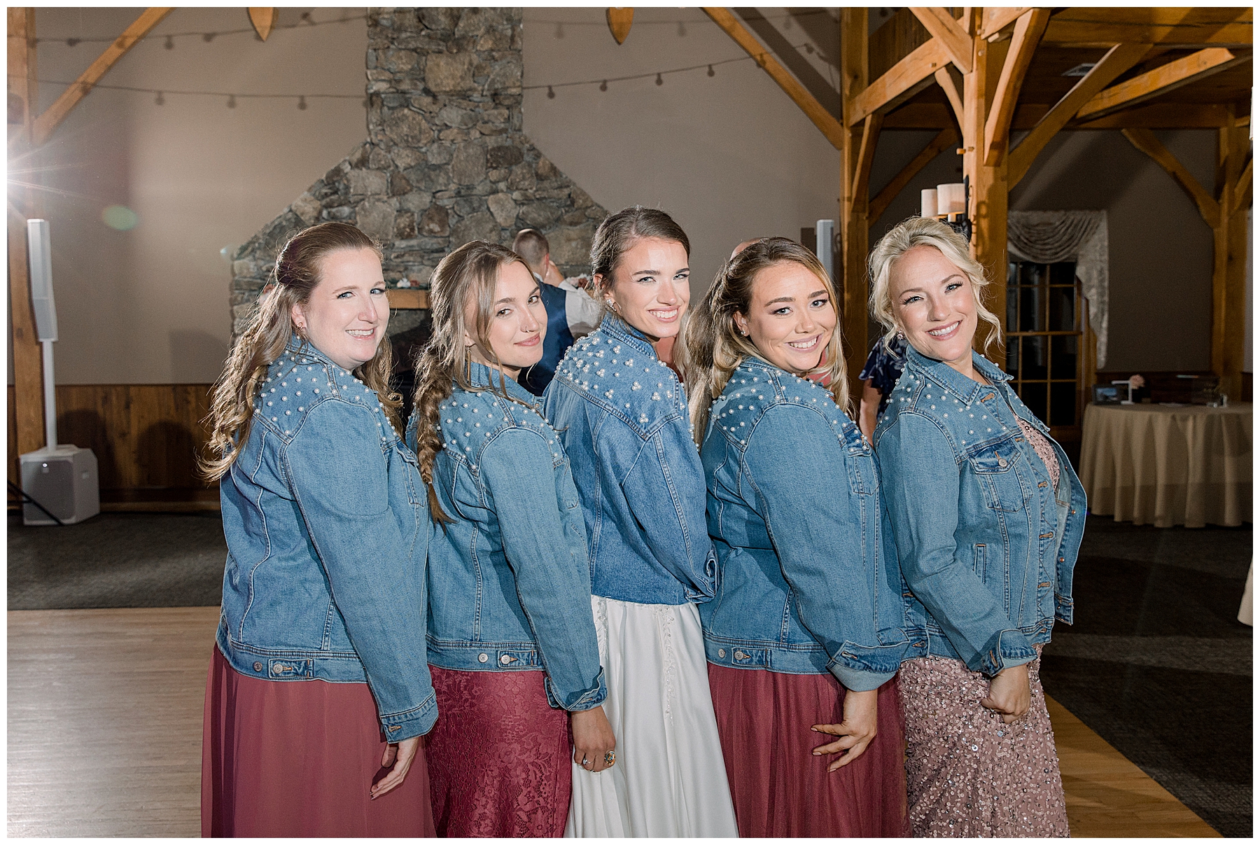 bride and bridesmaids in matching jean jackets