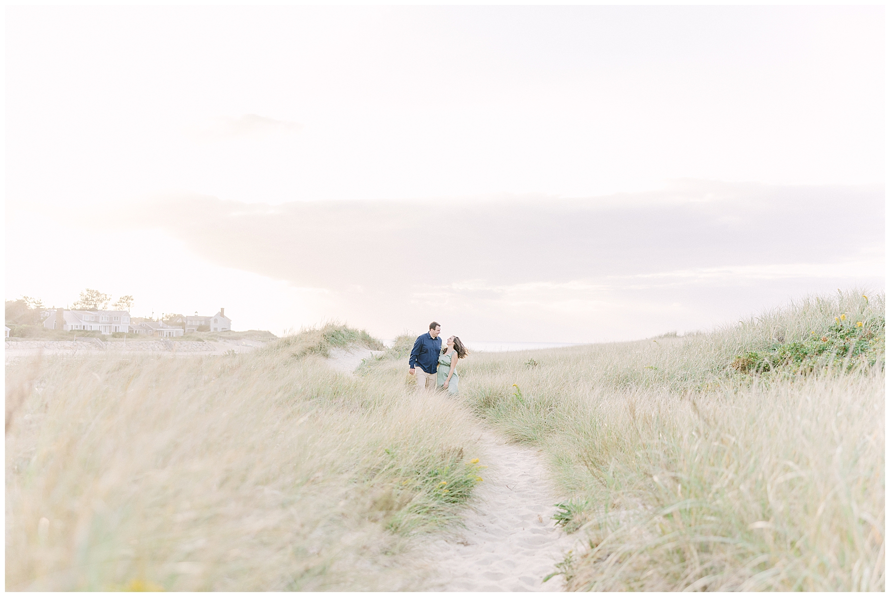couple walking down path at Cape Cod Ma Engagement