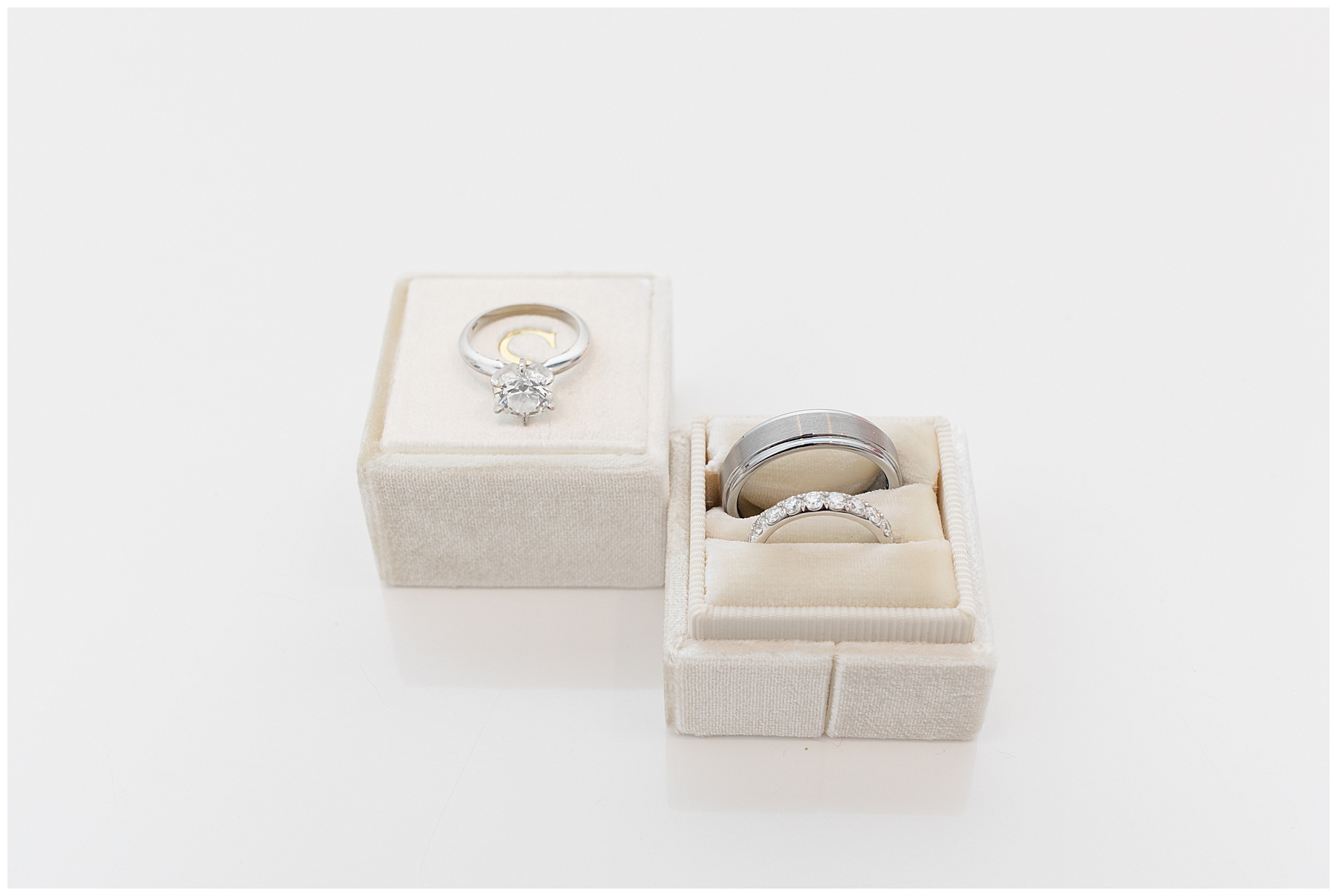 wedding rings in white ring box