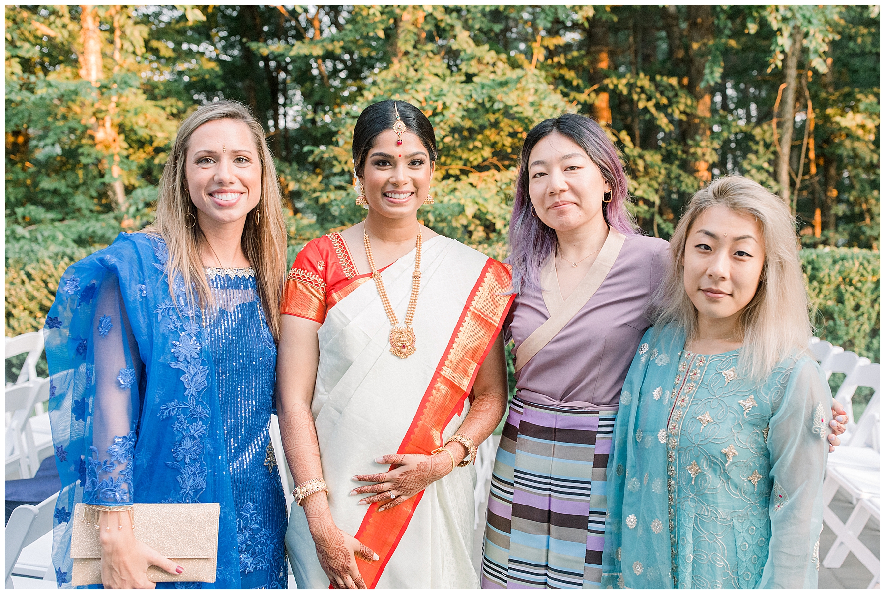 bride with three other women at wedding