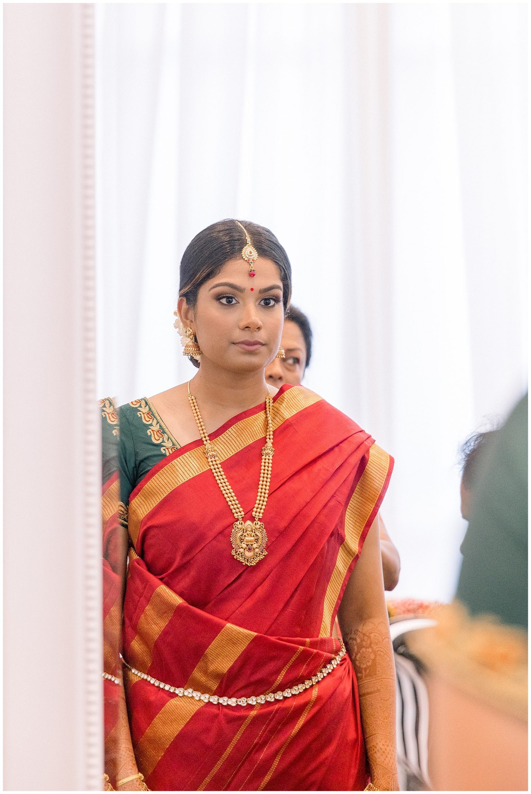 bride getting ready for traditional indian wedding