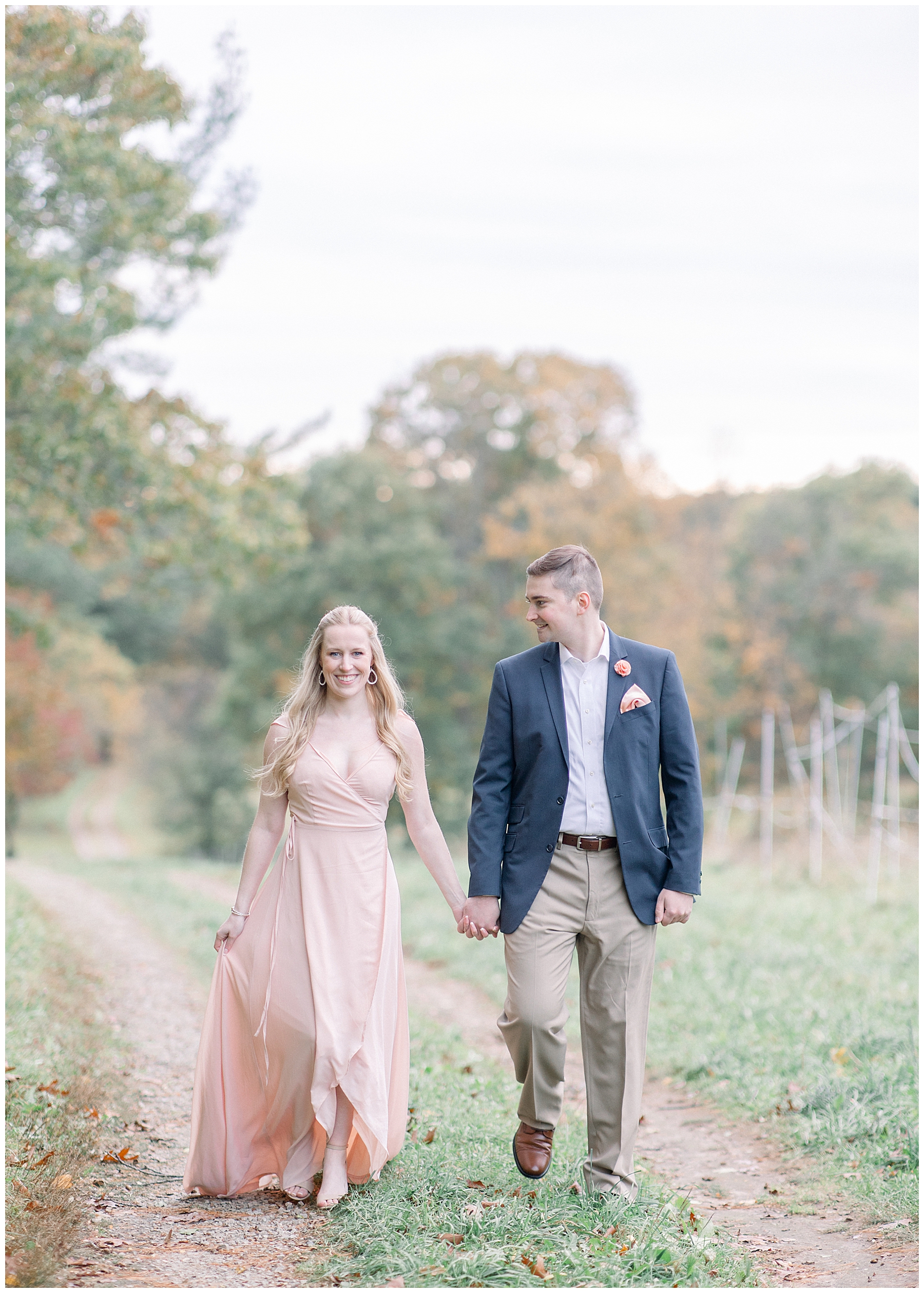 couple walking holding hands during Bradley Estate Engagement Session in MA
