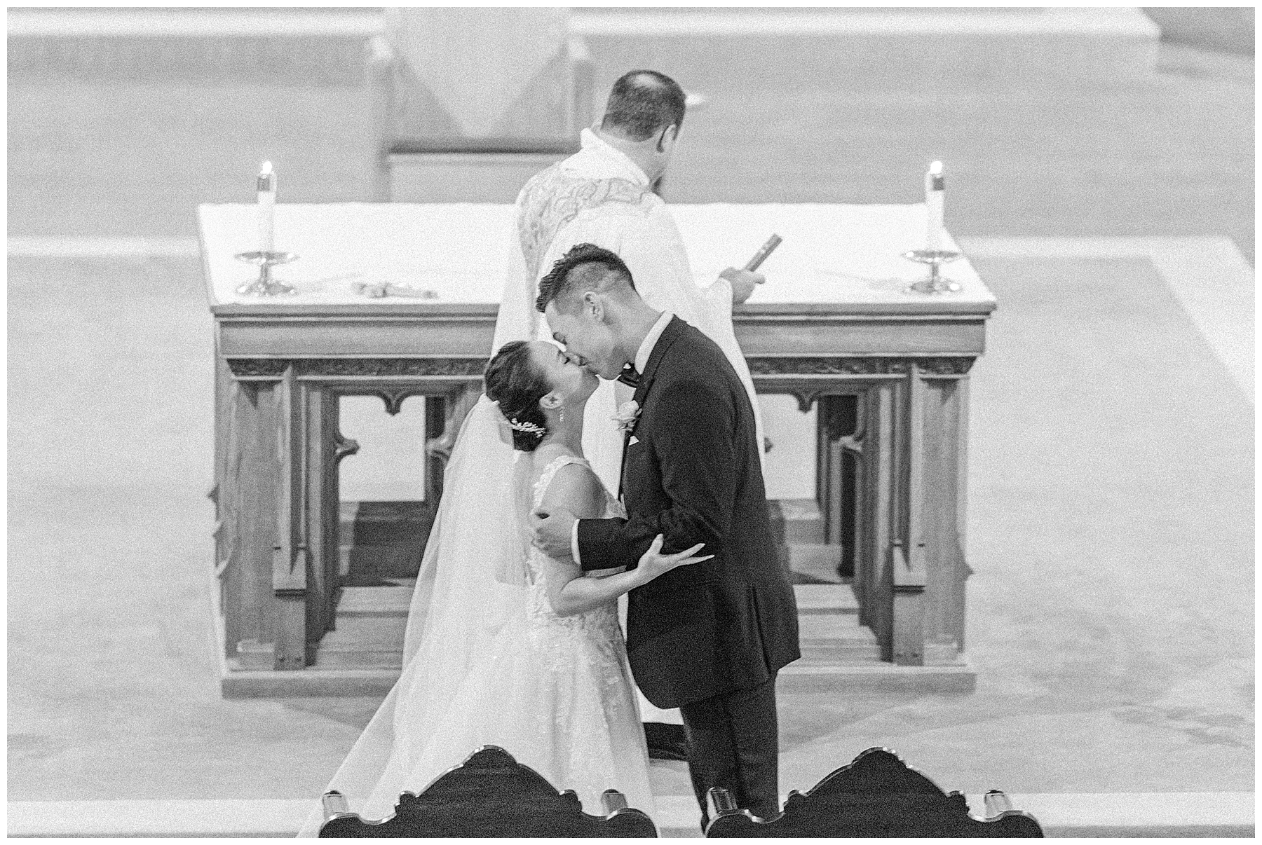couple kiss during ceremony