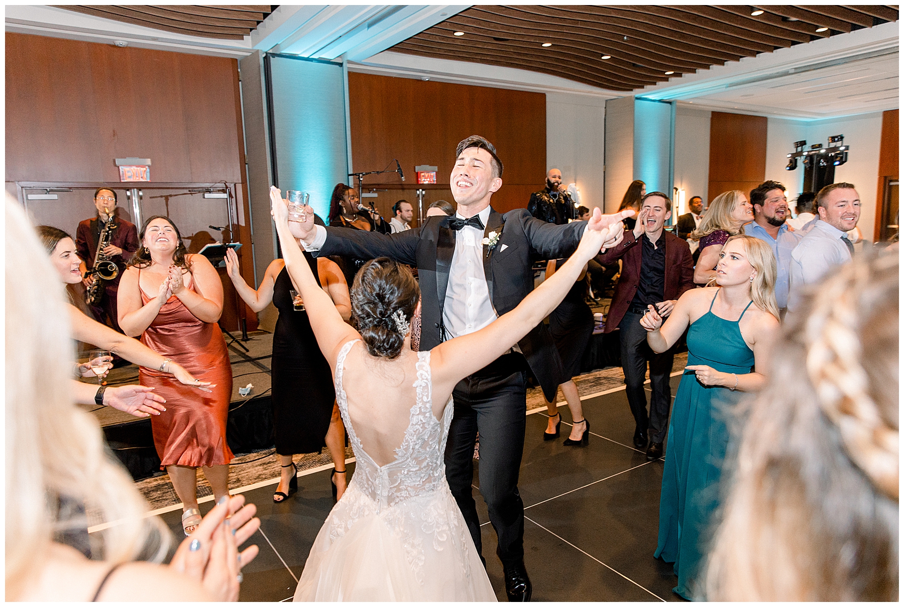 couple having fun and dancing at their Boston Marriott Long Wharf Wedding reception