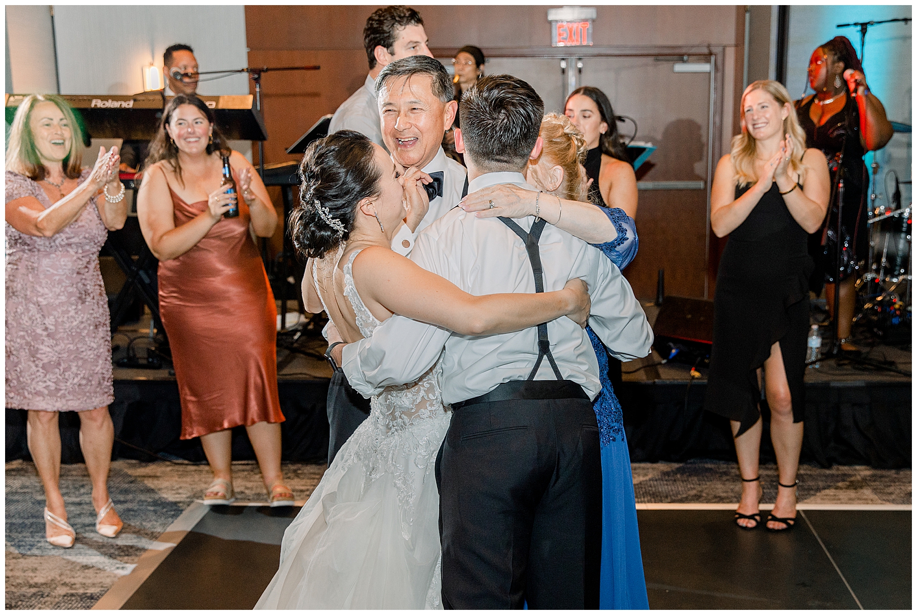 bride and groom dancing with family and friends at Boston Marriott Long Wharf Wedding reception