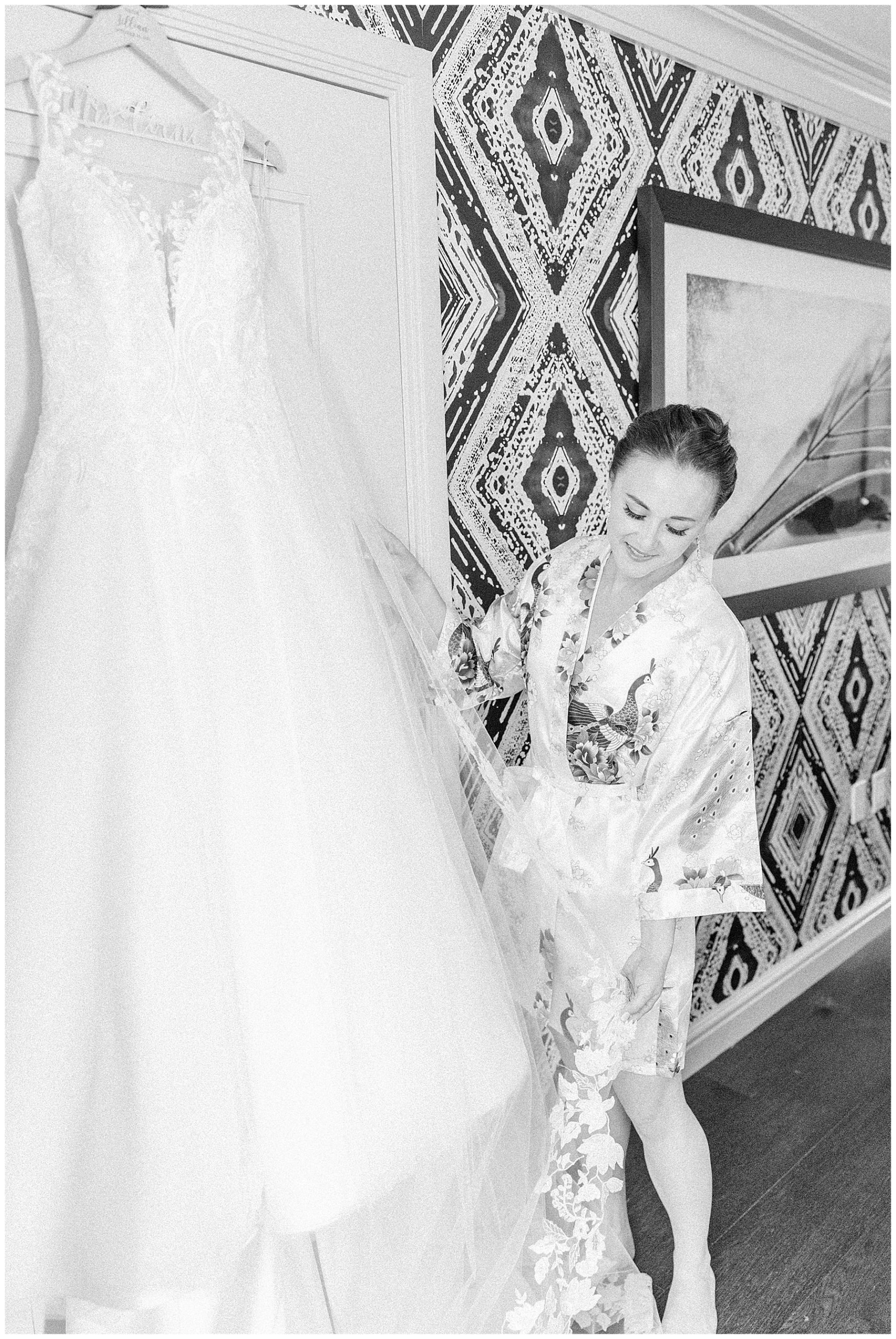 Bride looking at wedding dress