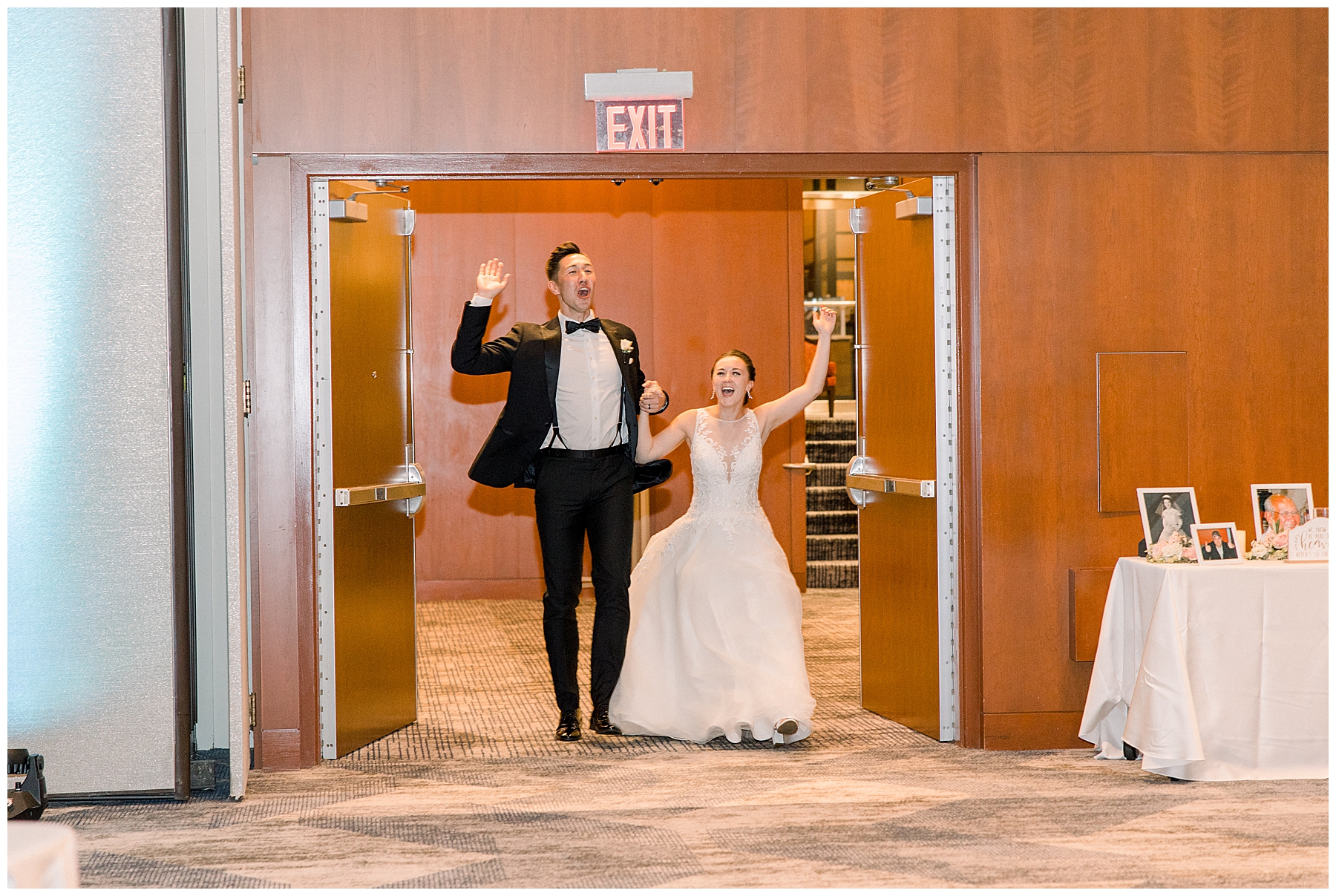 newlyweds make their grand entrance to their reception at Boston Marriott Long Wharf