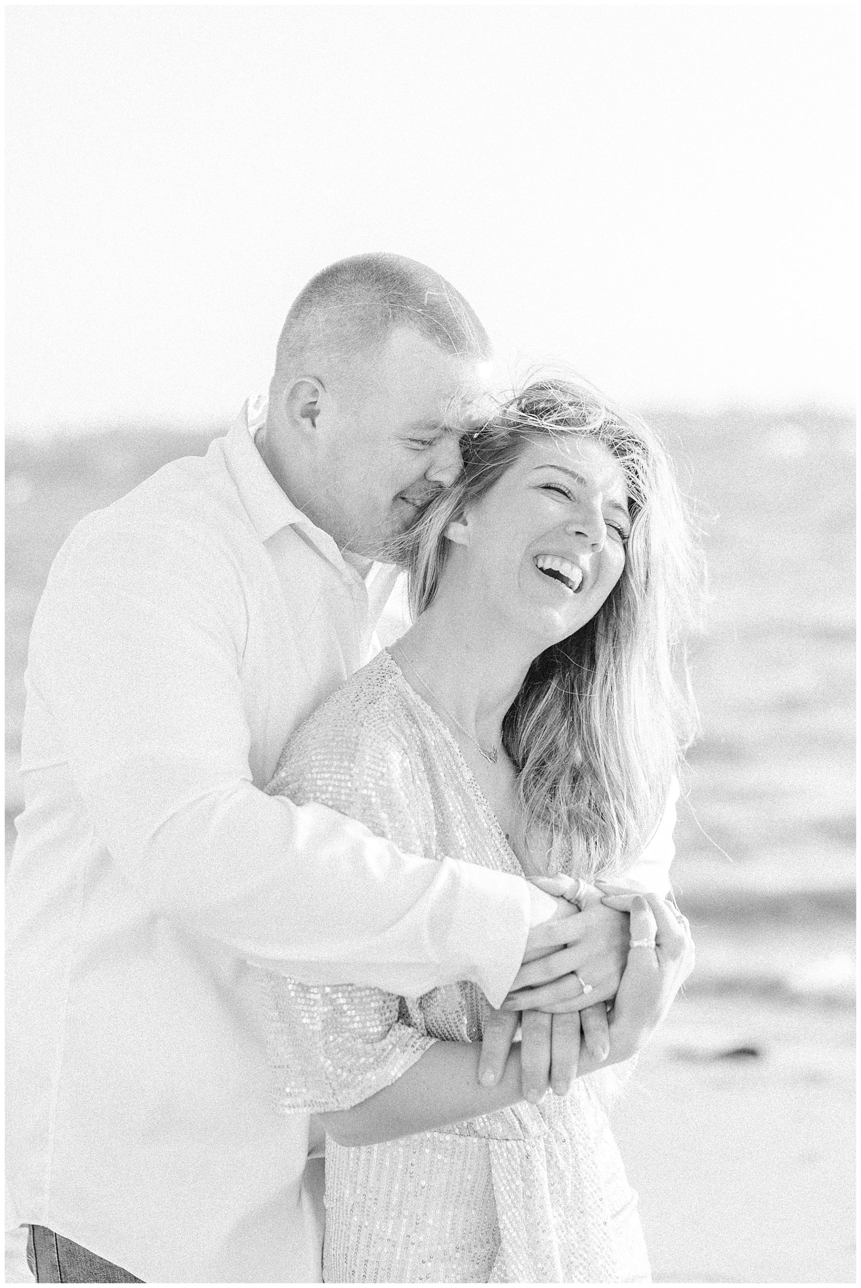 candid moment of couple during Cape Cod Beach Engagement Session