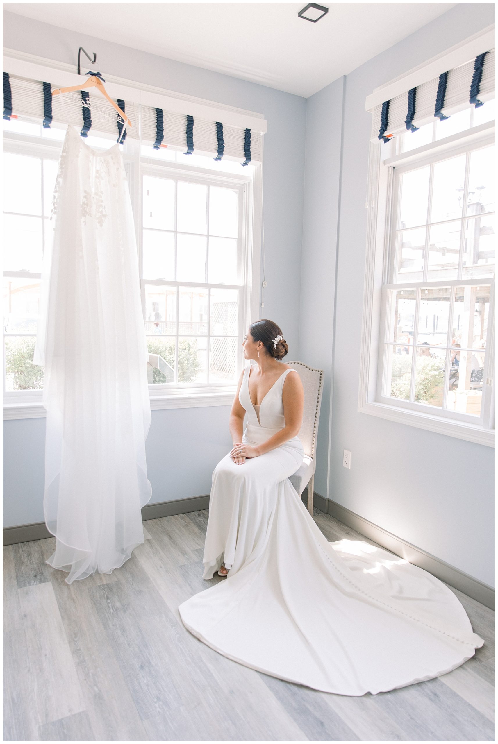 bride looking at window before ceremony