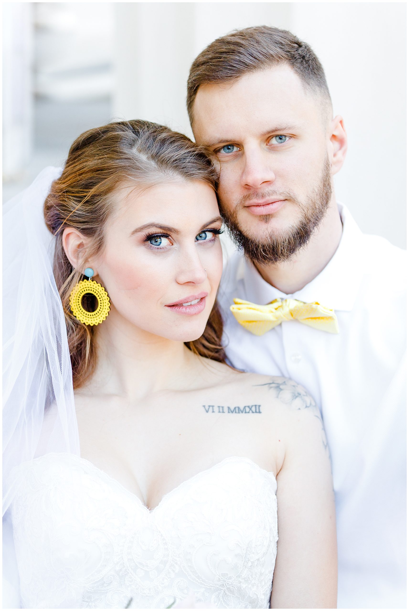 newlyweds with yellow accessories