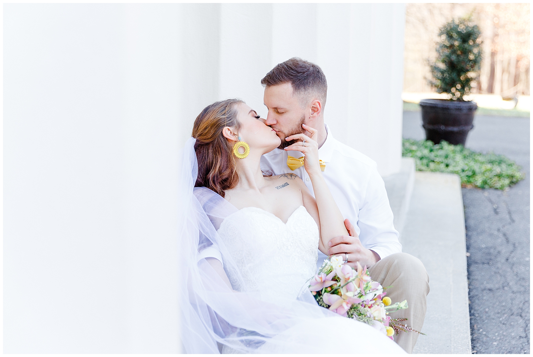 bride and groom sitting on stairs from Wadsworth Mansion Wedding editorial