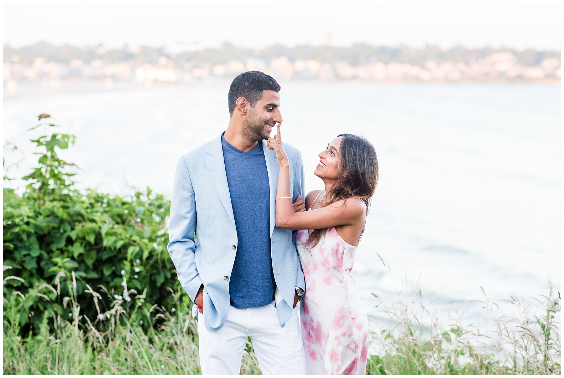 candid moment of couple at The Chanler at Cliff Walk