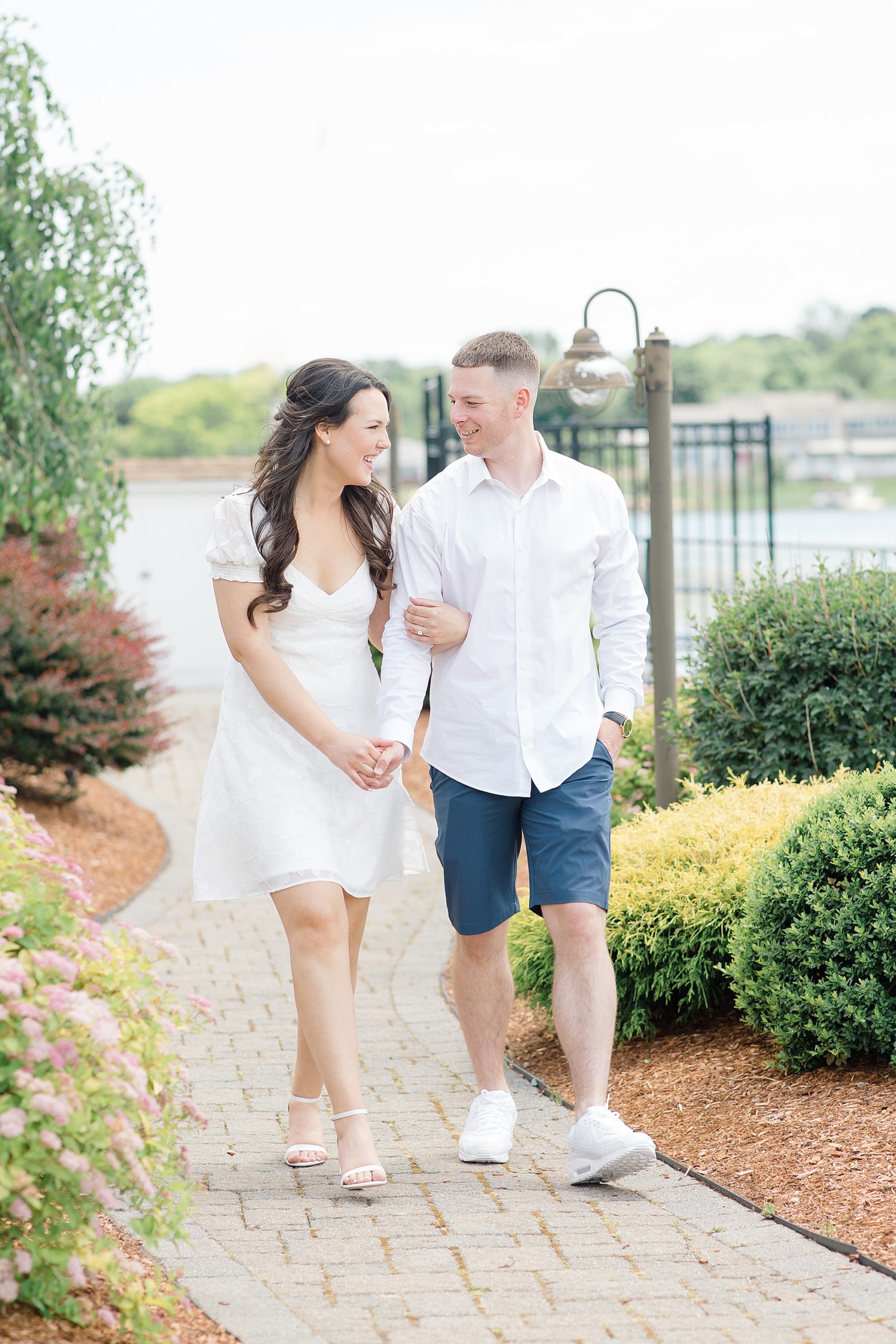 couple walking be the scenic gardens at one of the best wedding venues in Massachusetts, the Danversport