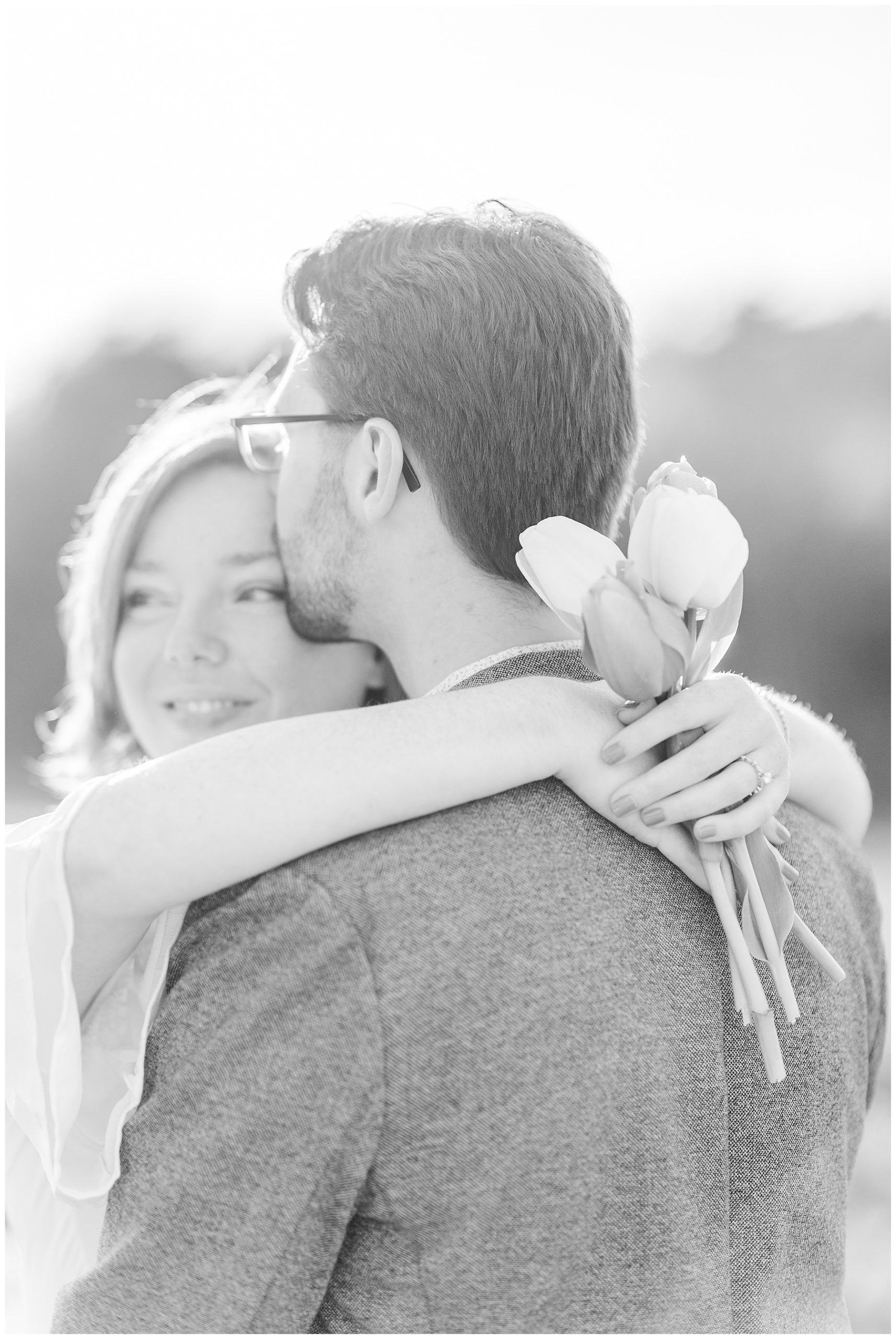 couple hug during their engagement session