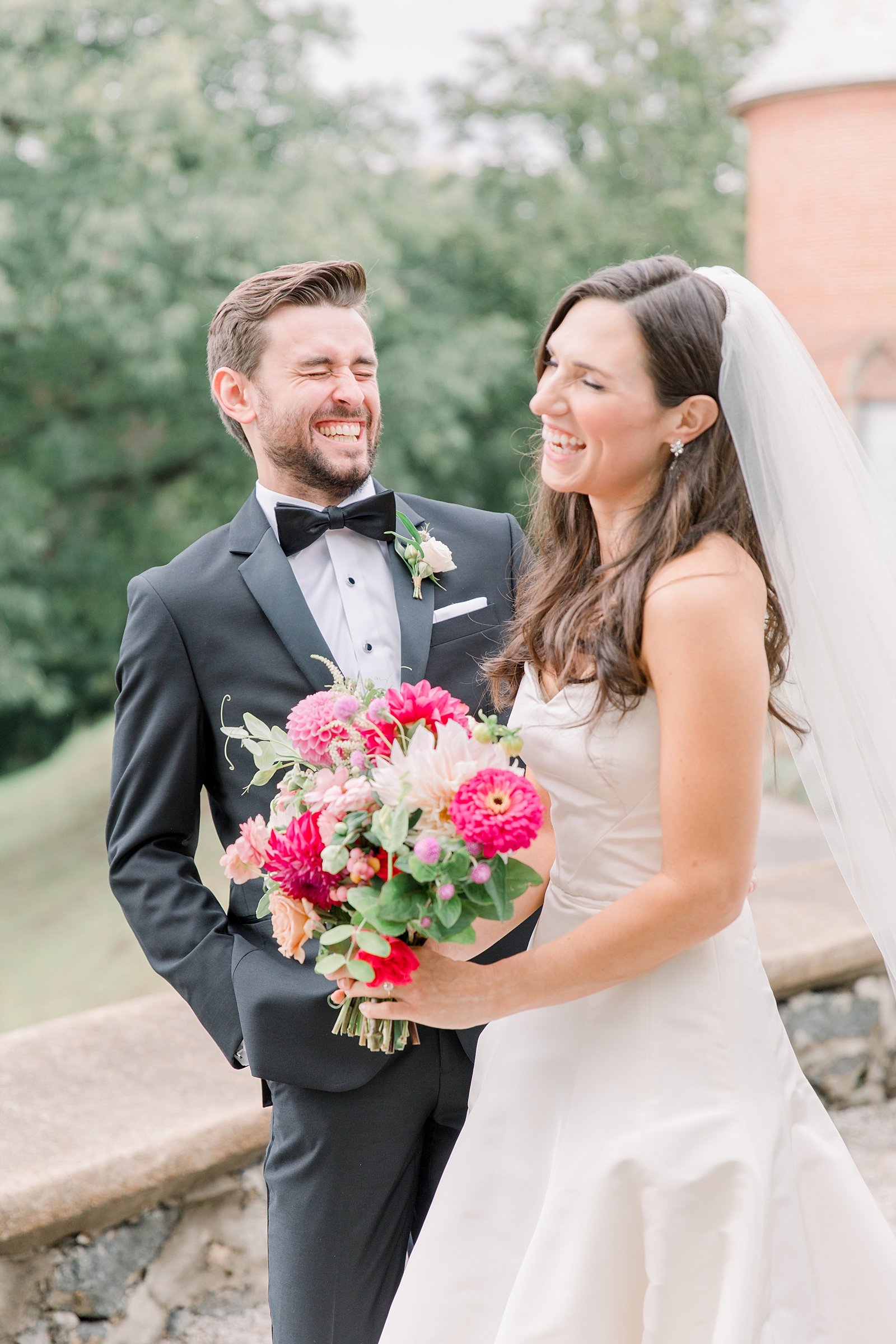 couple share moment of laughter before wedding ceremony  