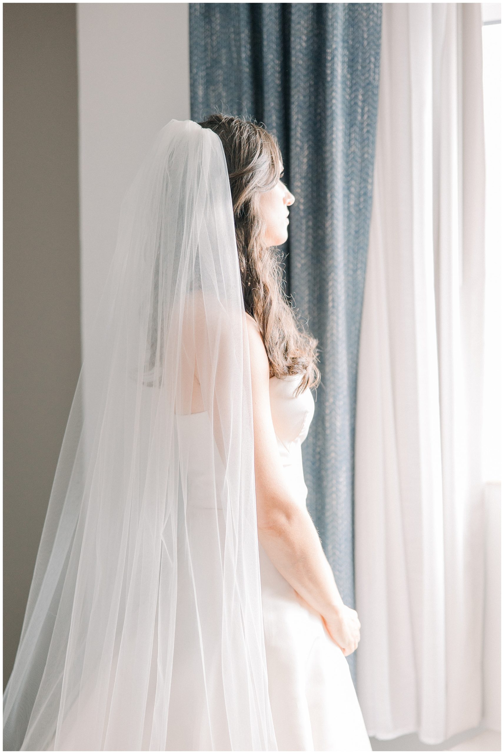bride looking out window 