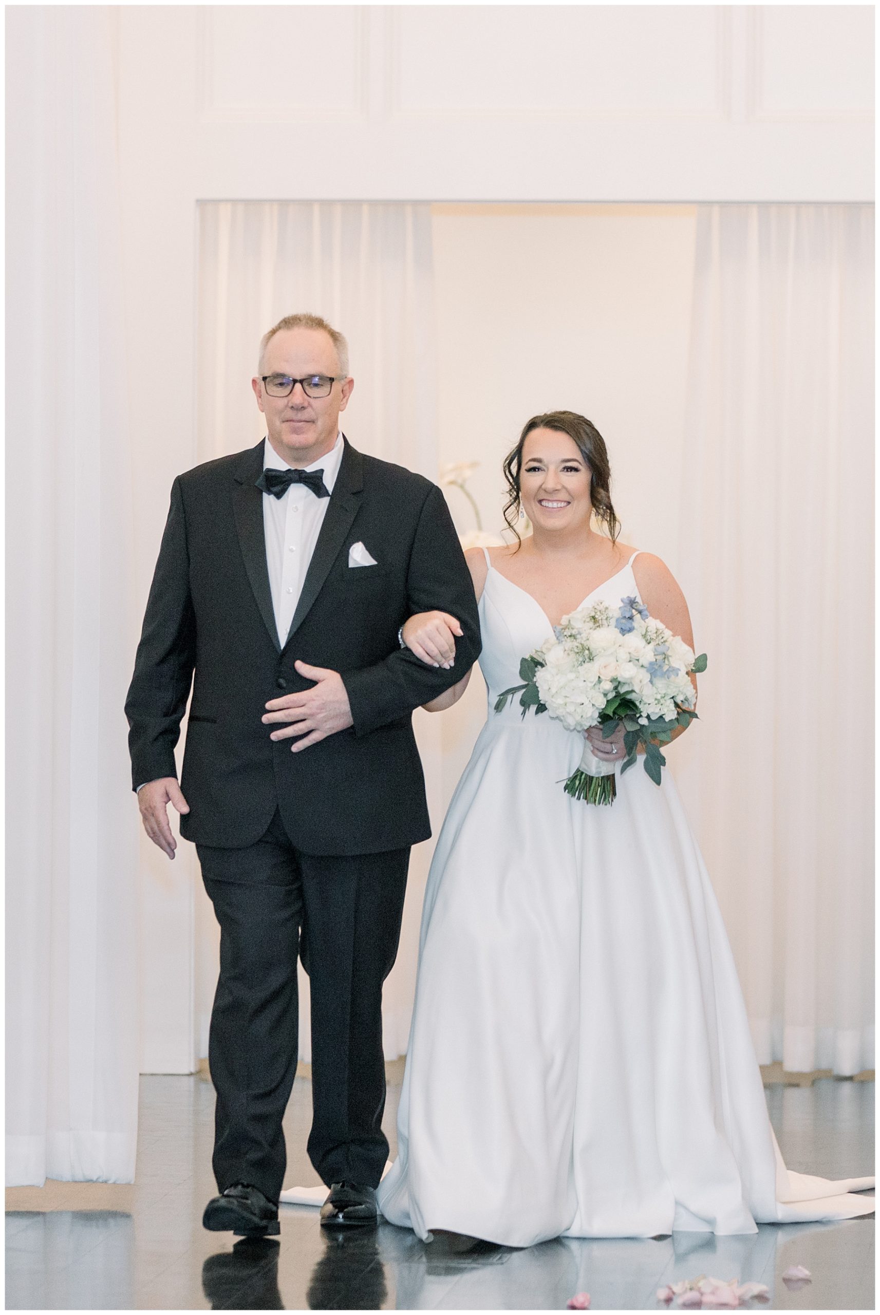 dad walking daughter down the aisle 