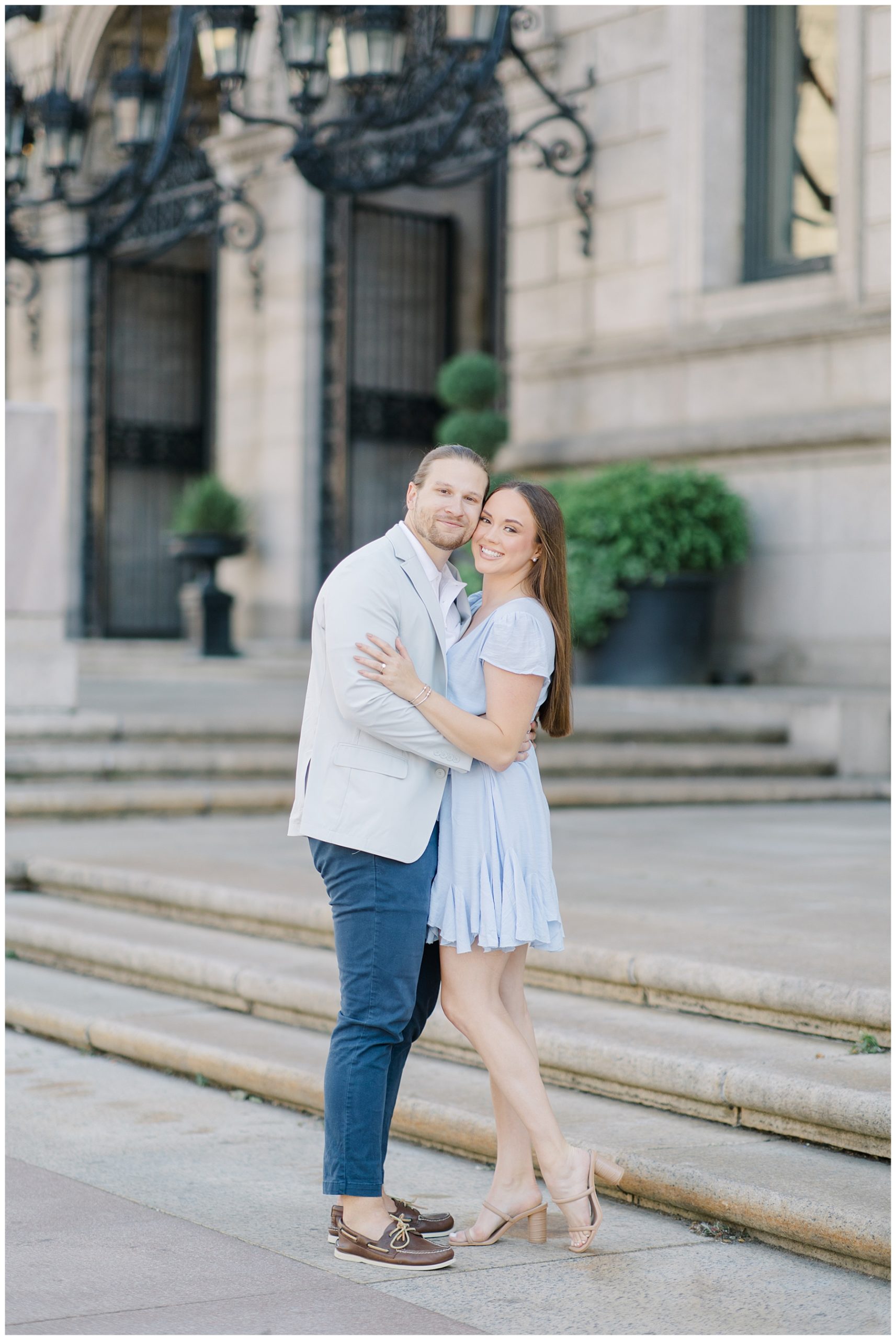 couple in front of beautiful building in boston during engagement session