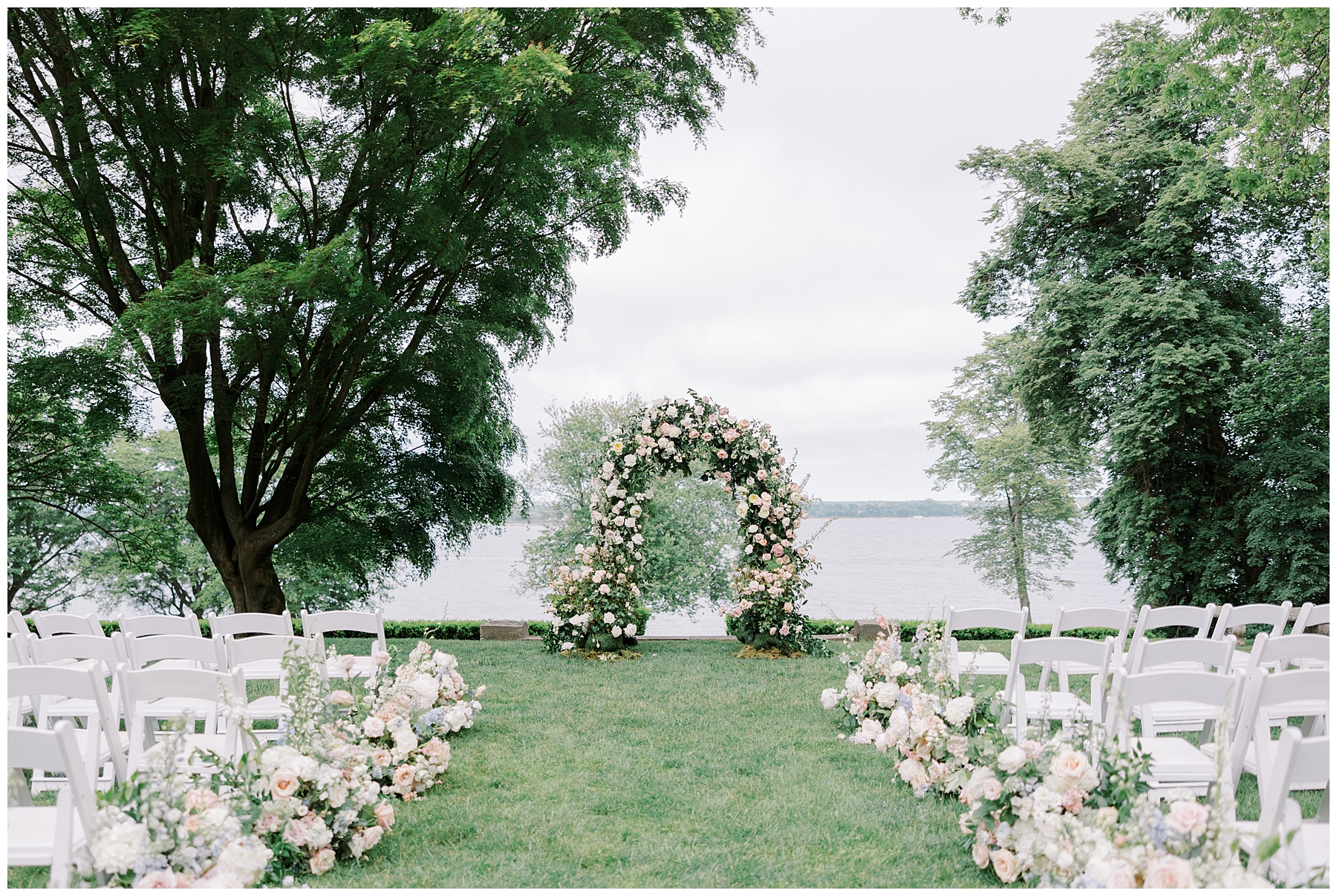 Dreamy Glen Manor Wedding ceremony facing the water 