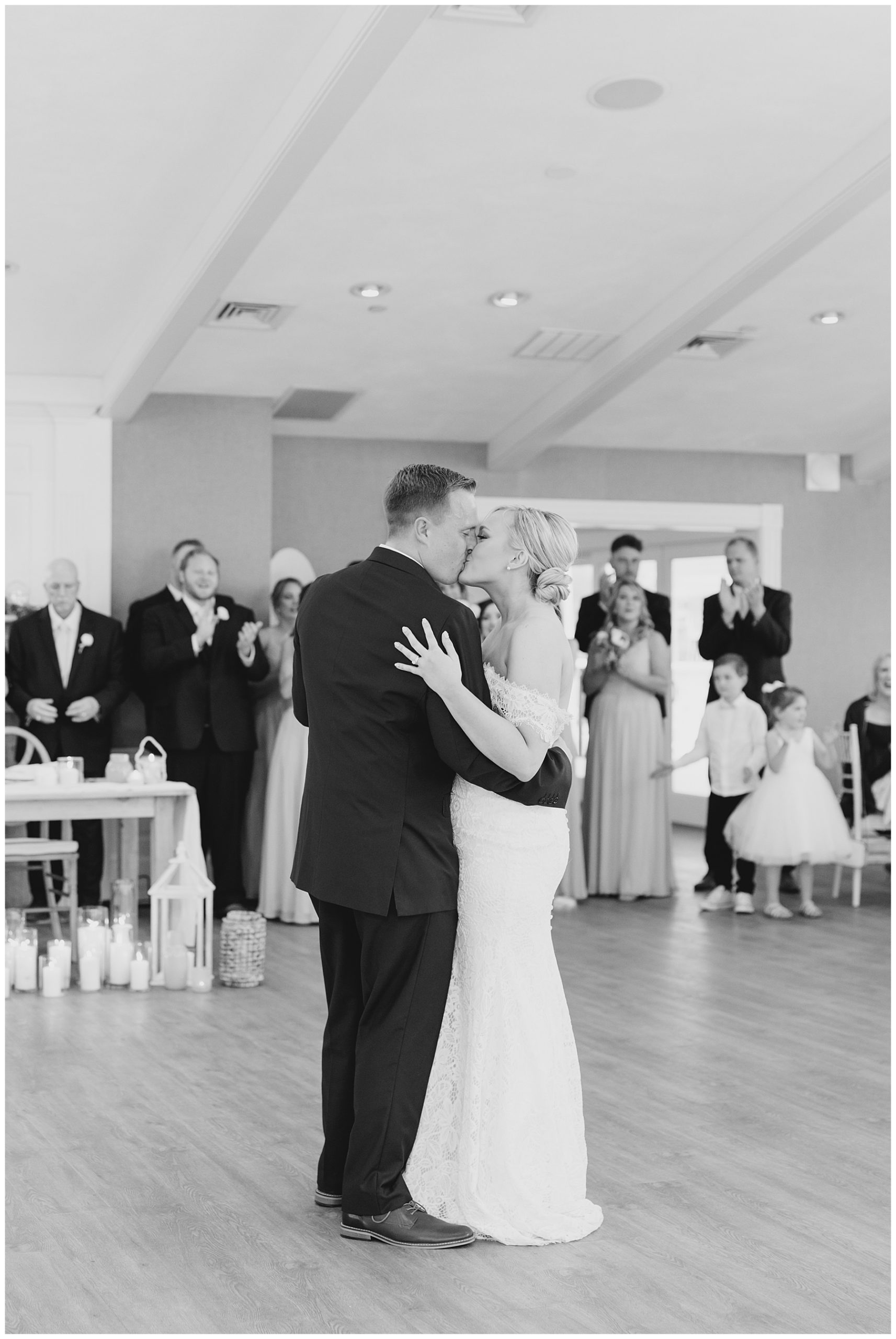 newlyweds kiss during first dance