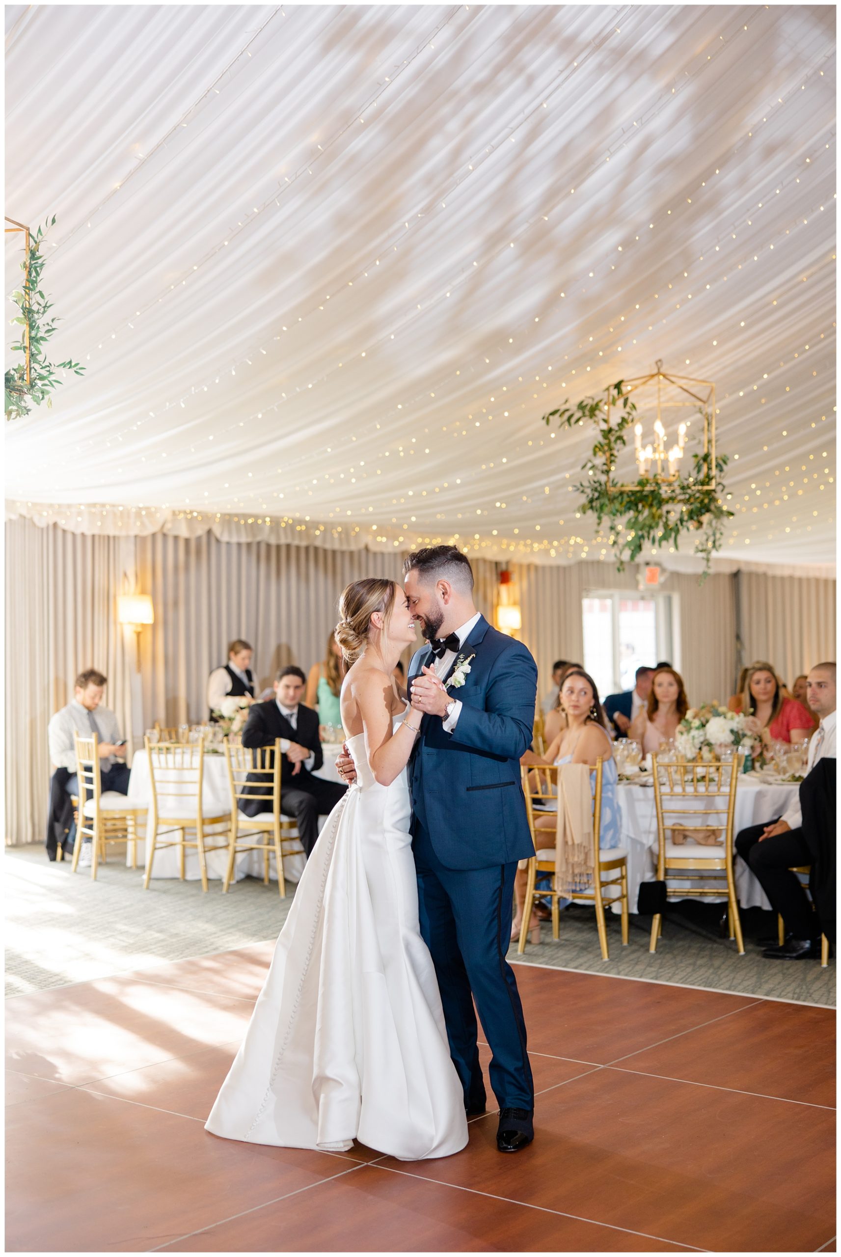 candid moment of bride and groom on dance floor