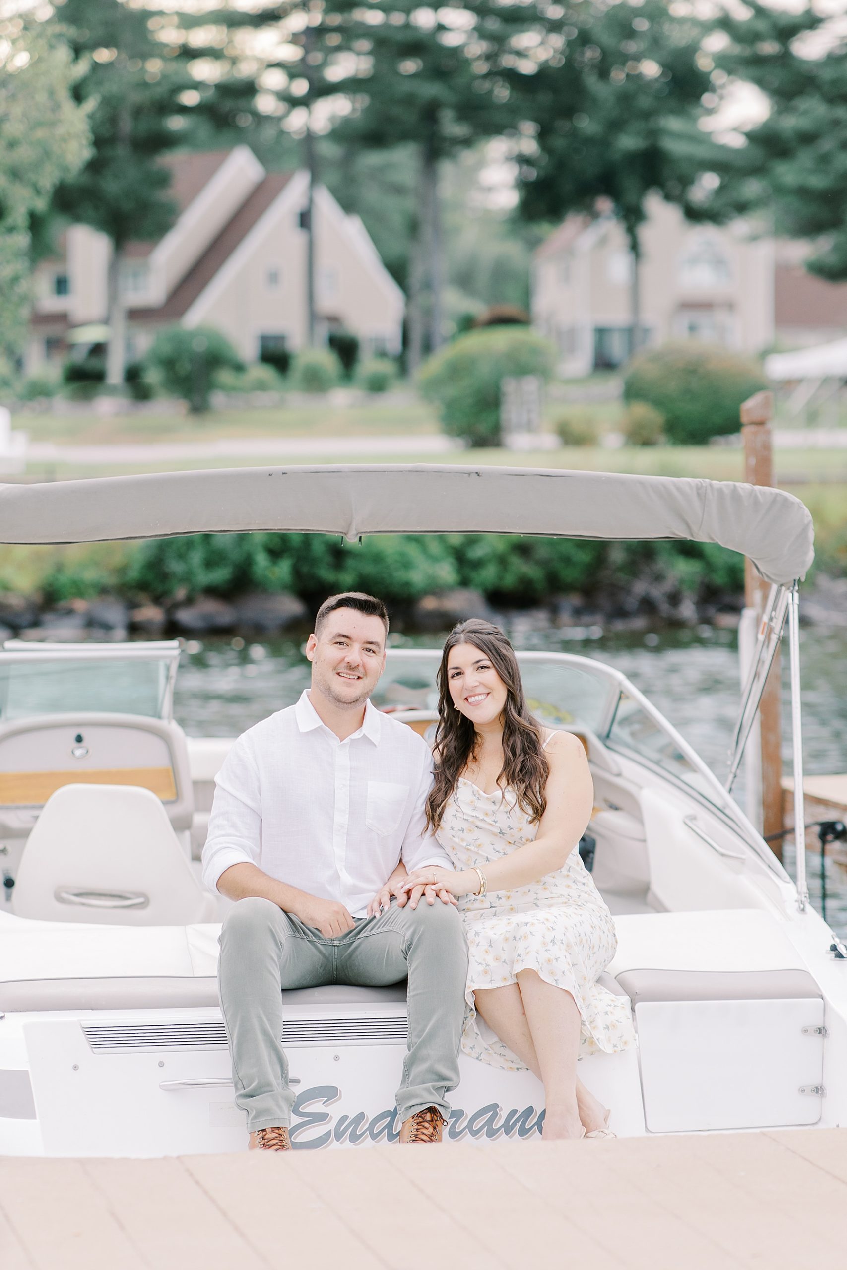 couple sitting on back of boat