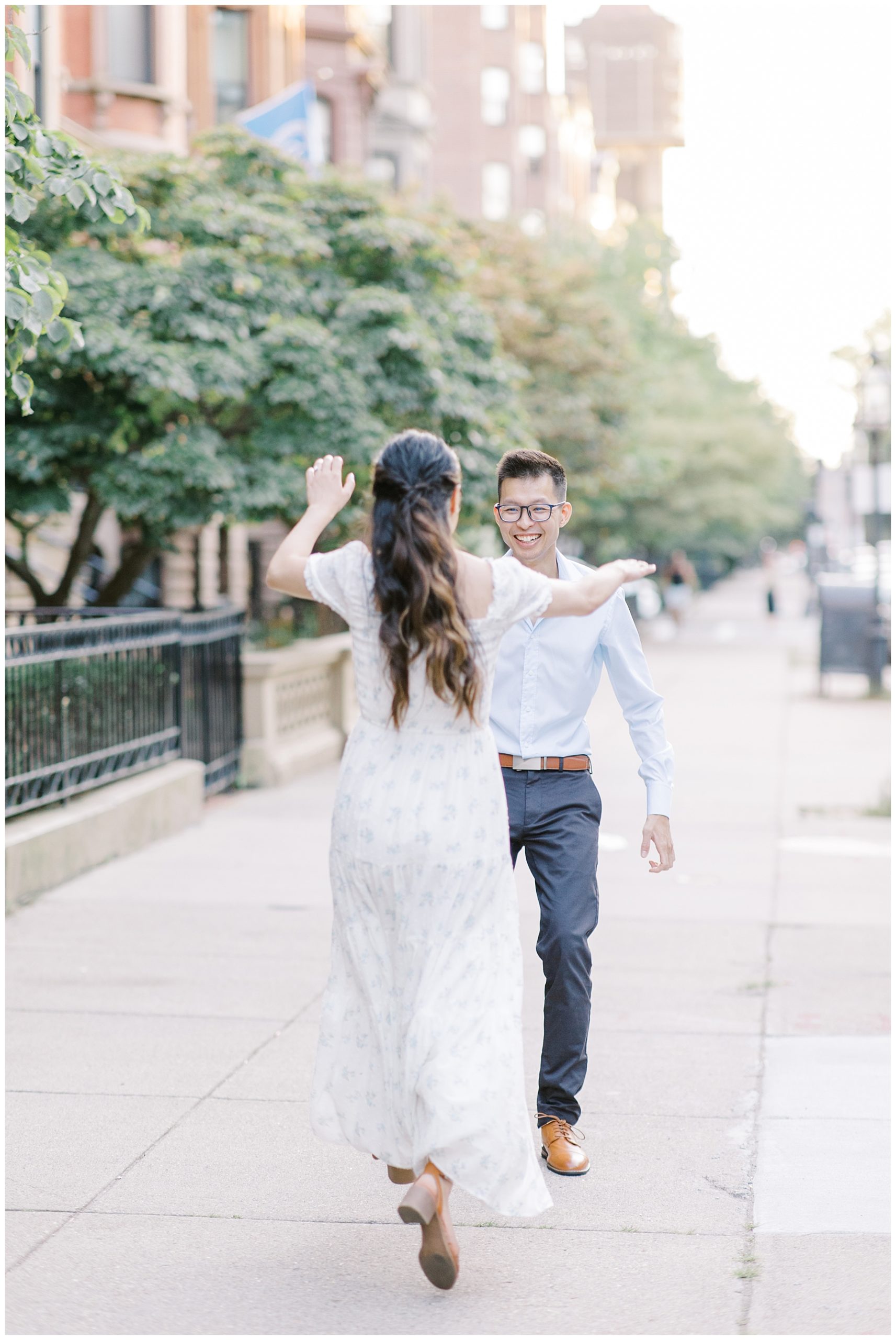 couple dancing on the sidewalk during Boston Summer Engagement Session