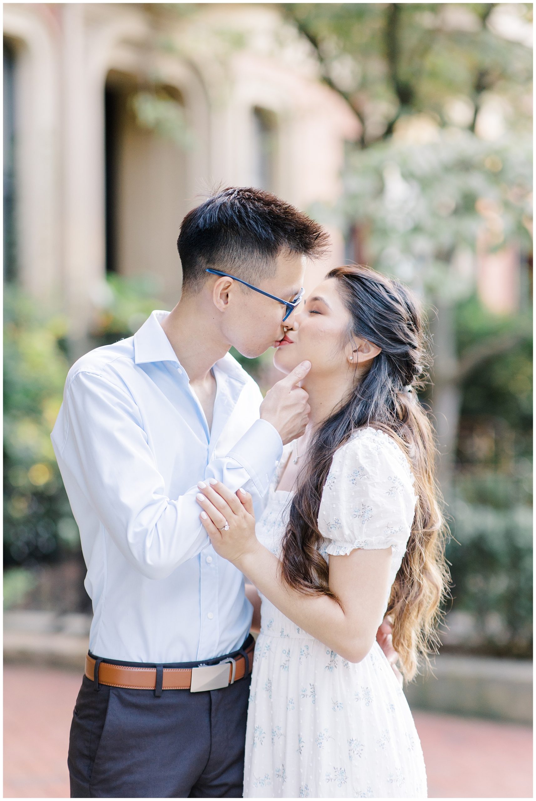 couple kiss during their engagement portraits