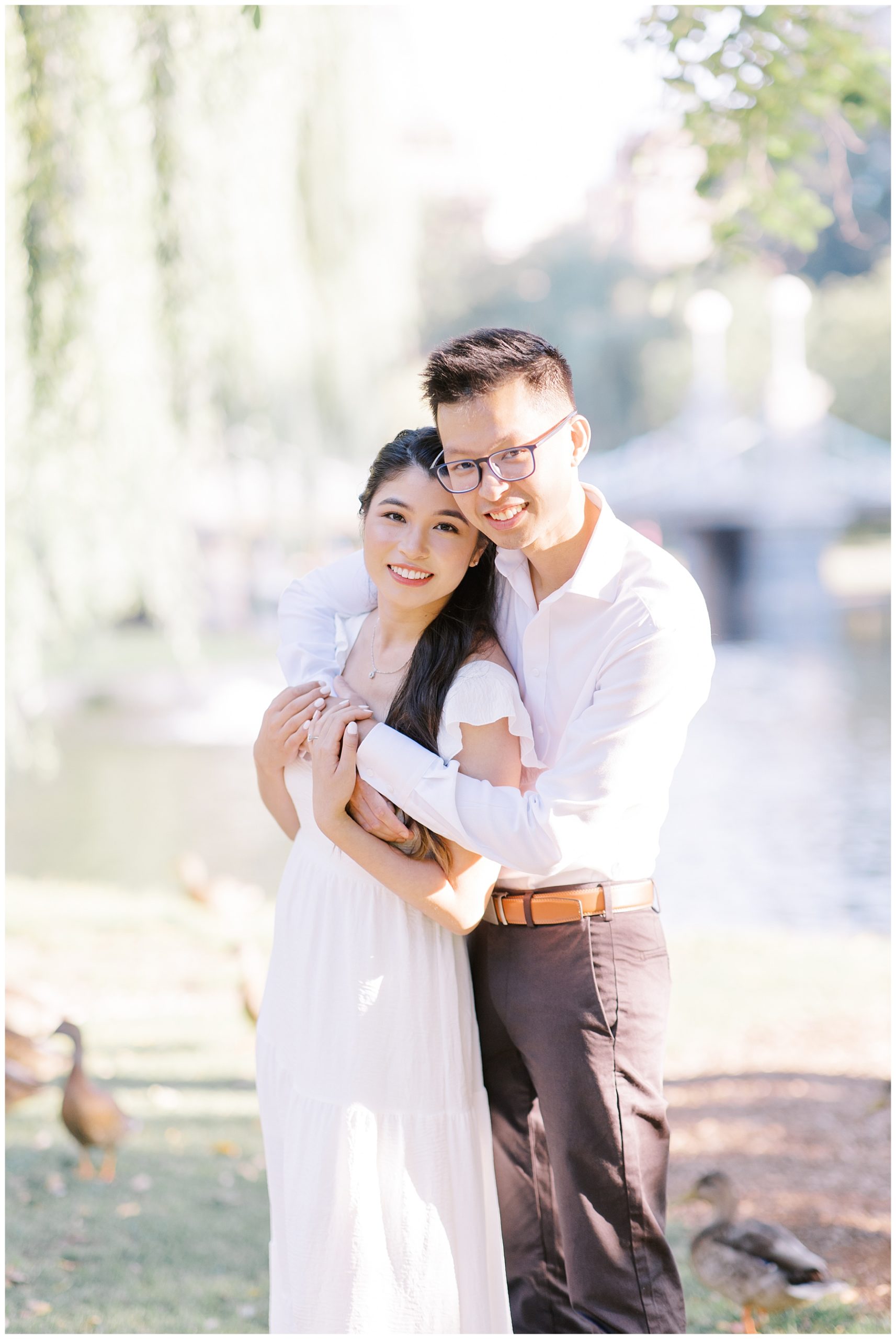 couple under a willow tree for Boston Summer Engagement Session
