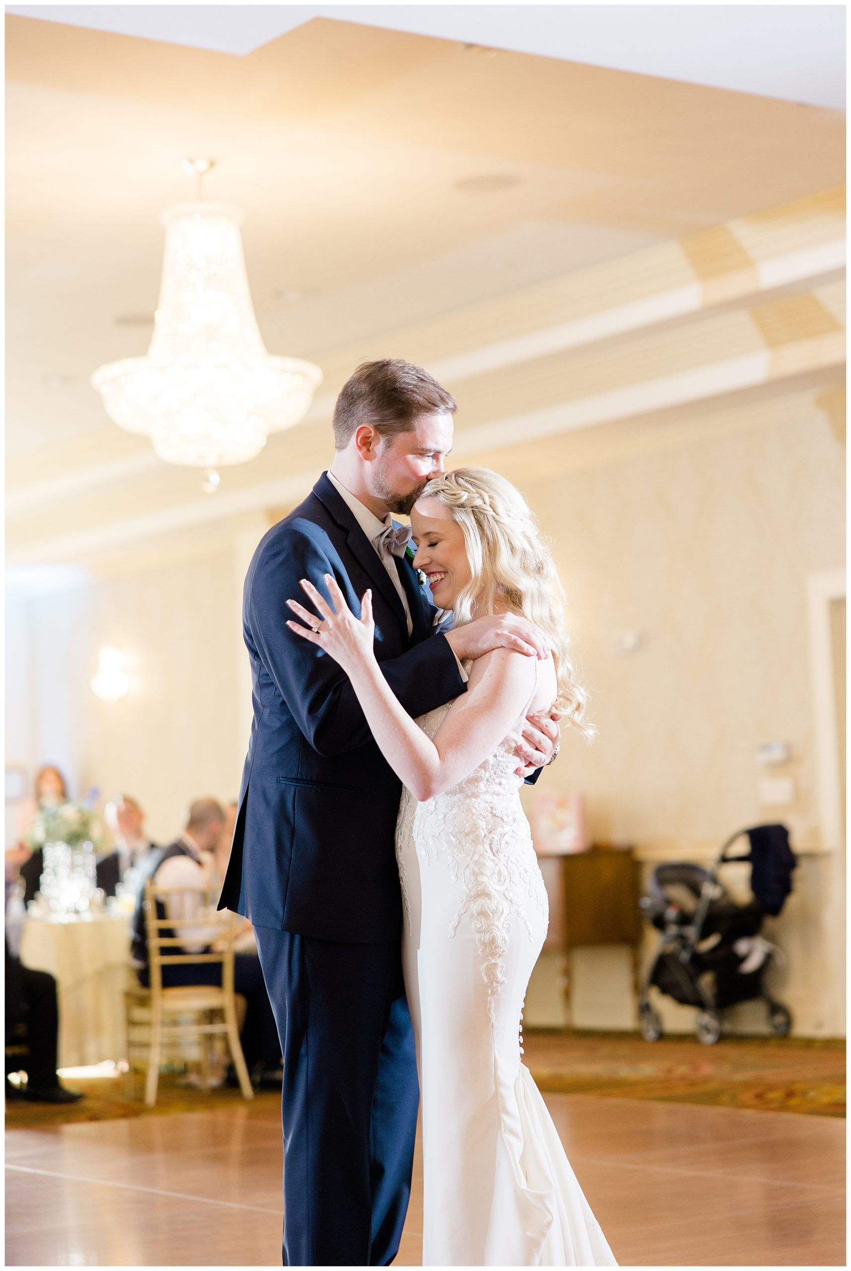 newlyweds share first dance togther