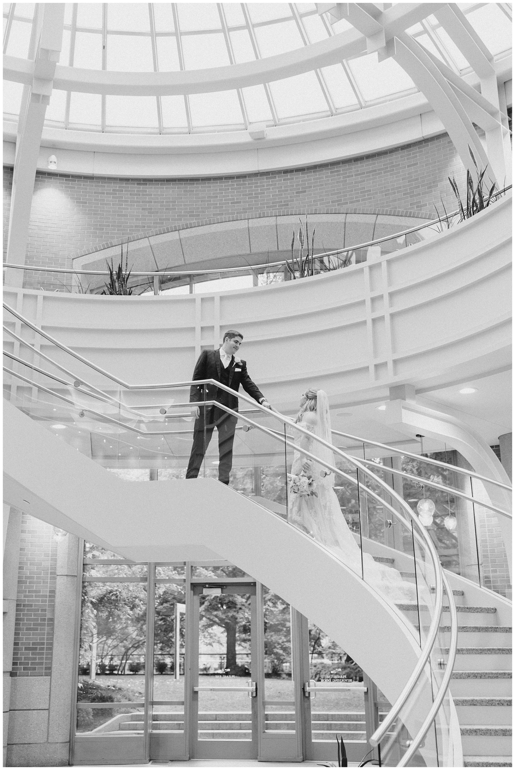 couple on staircase at Seaport hotel for Boston wedding 2.0 portraits