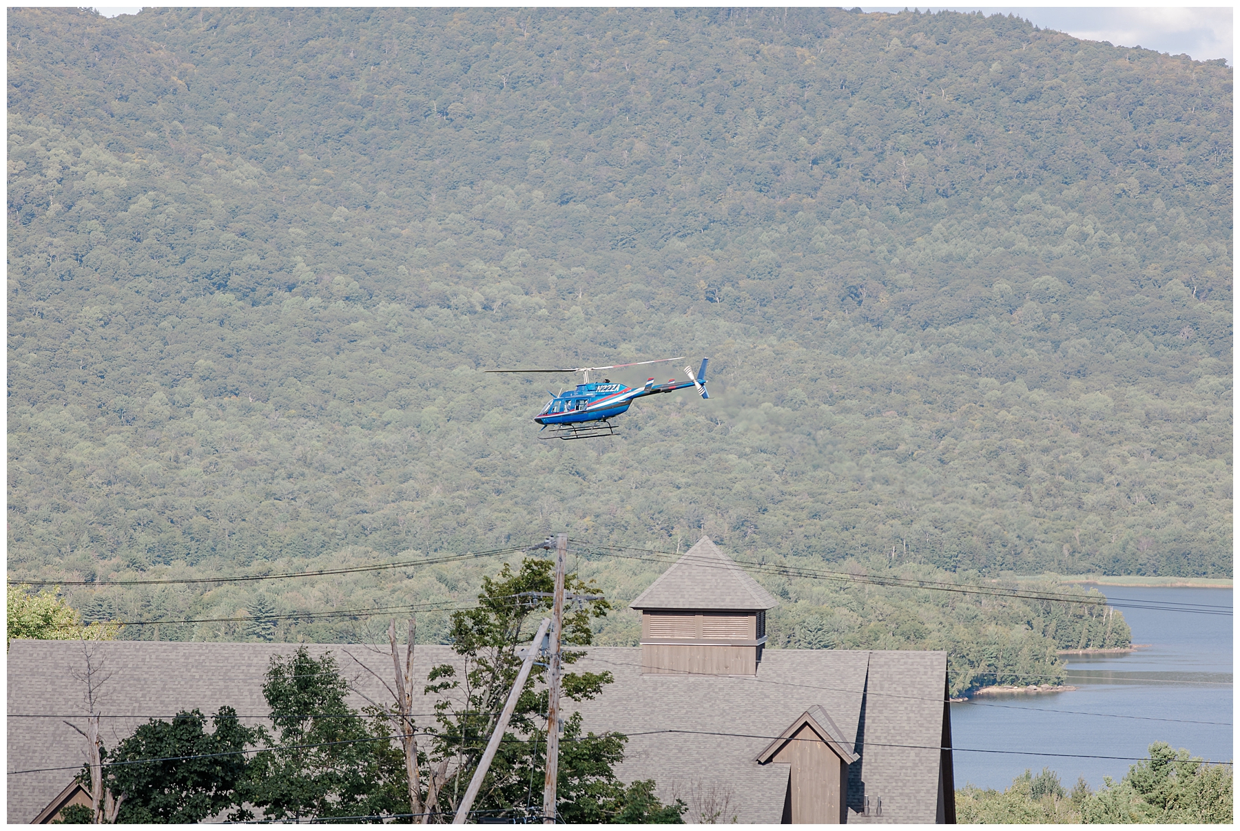 helicopter brings in groom to wedding