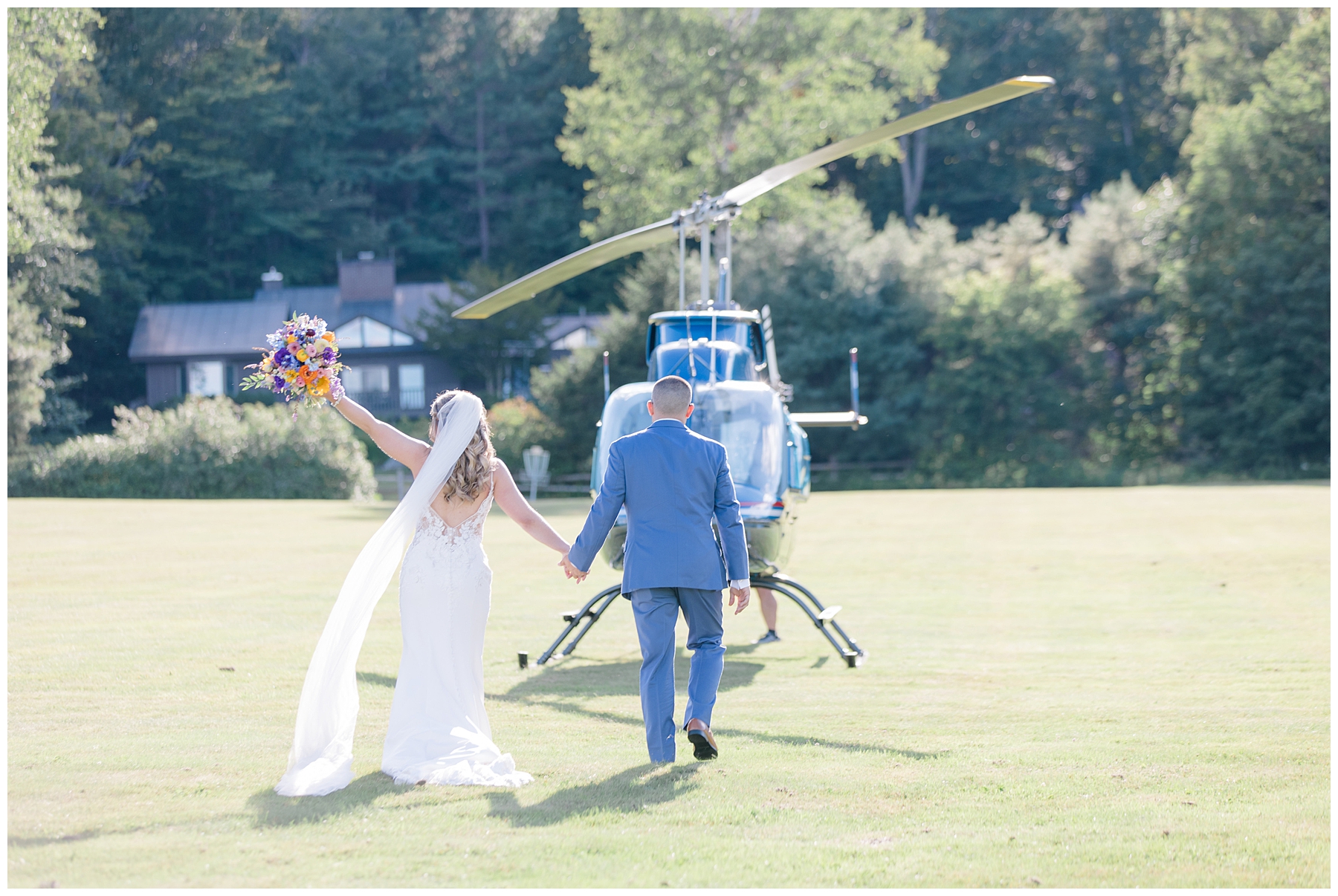newlyweds exit in a helicopter 